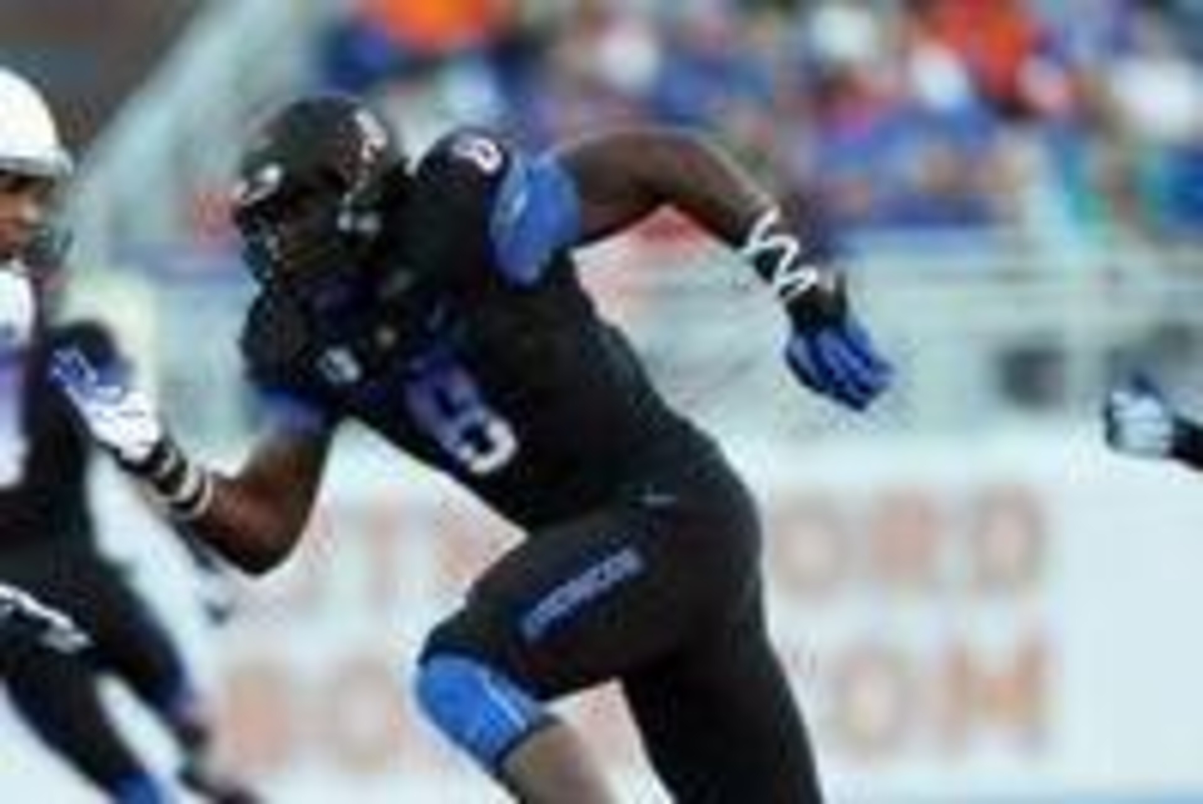 Oct 19, 2013; Boise, ID, USA; Boise State Broncos defensive end Demarcus Lawrence (8) during the game against the Nevada Wolf Pack at Bronco Stadium. Mandatory Credit: Brian Losness-USA TODAY Sports