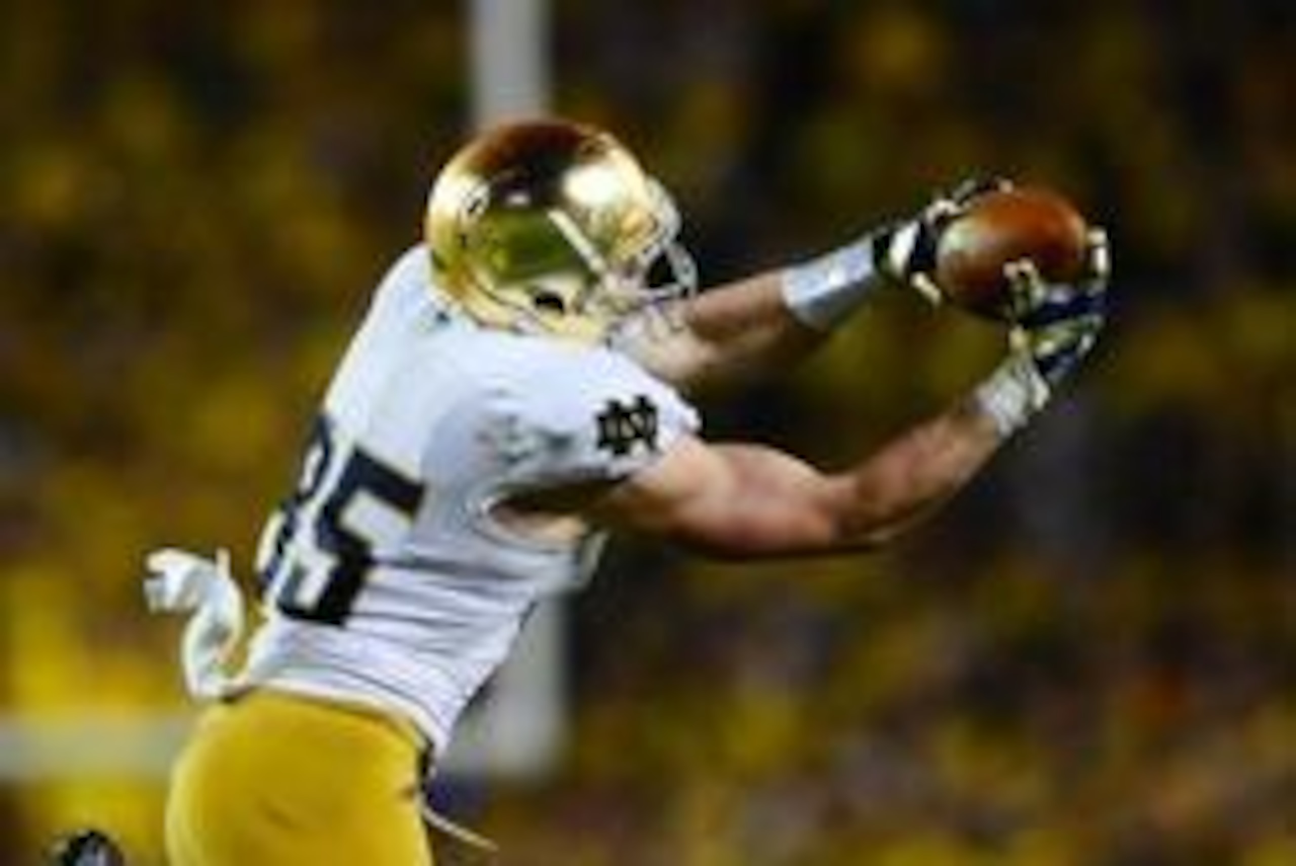 Sep 7, 2013; Ann Arbor, MI, USA; Notre Dame Fighting Irish tight end Troy Niklas (85) makes a catch during the fourth quarter against the Michigan Wolverines at Michigan Stadium. Michigan Wolverines defeated Notre Dame Fighting Irish 41-30. Mandatory Cred