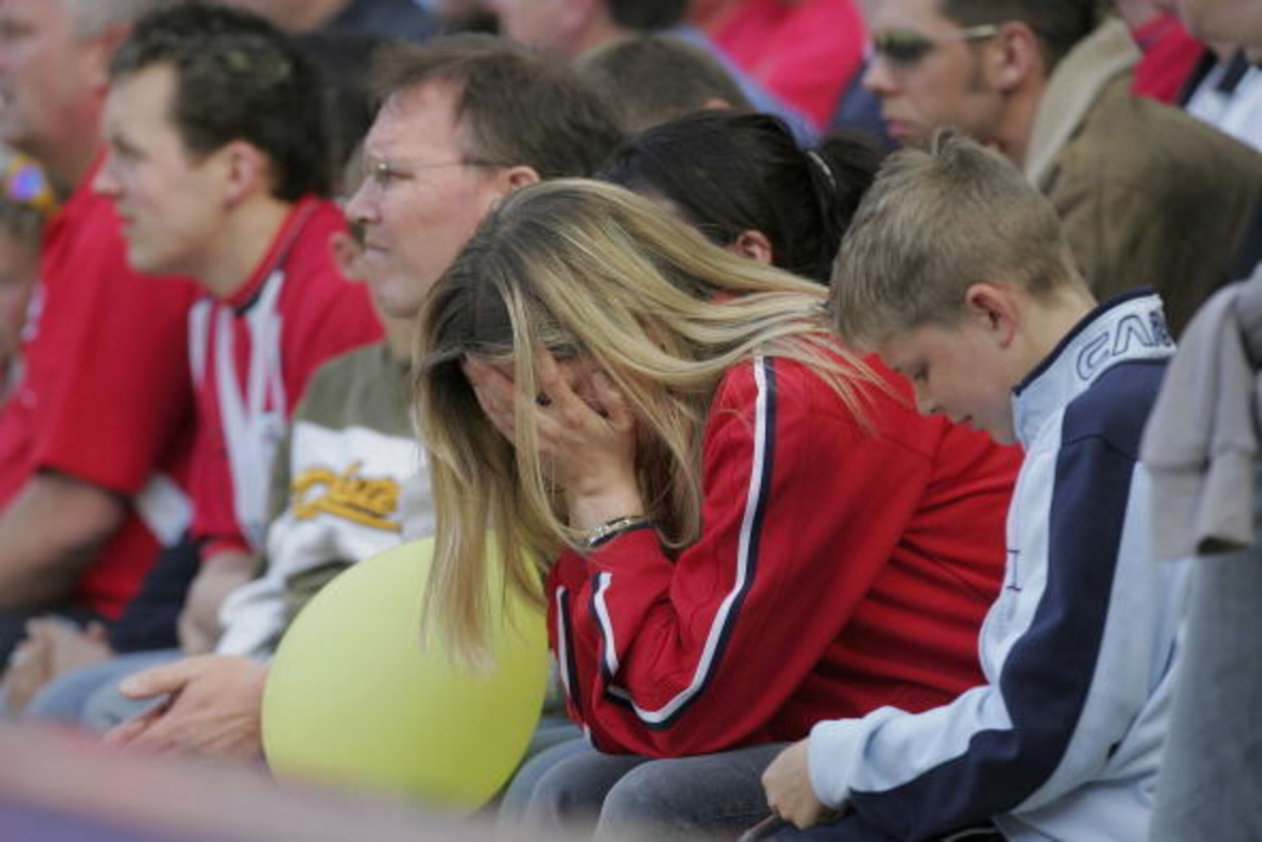 SOUTHAMPTON, ENGLAND -  MAY 15:  A distraught Southampton fan hold her head during the Barclays Premiership match between Southampton and Manchester United on May 15, 2004 at the St. Mary's Stadium in Southampton, England. (Photo by Mike Hewitt/Getty Imag