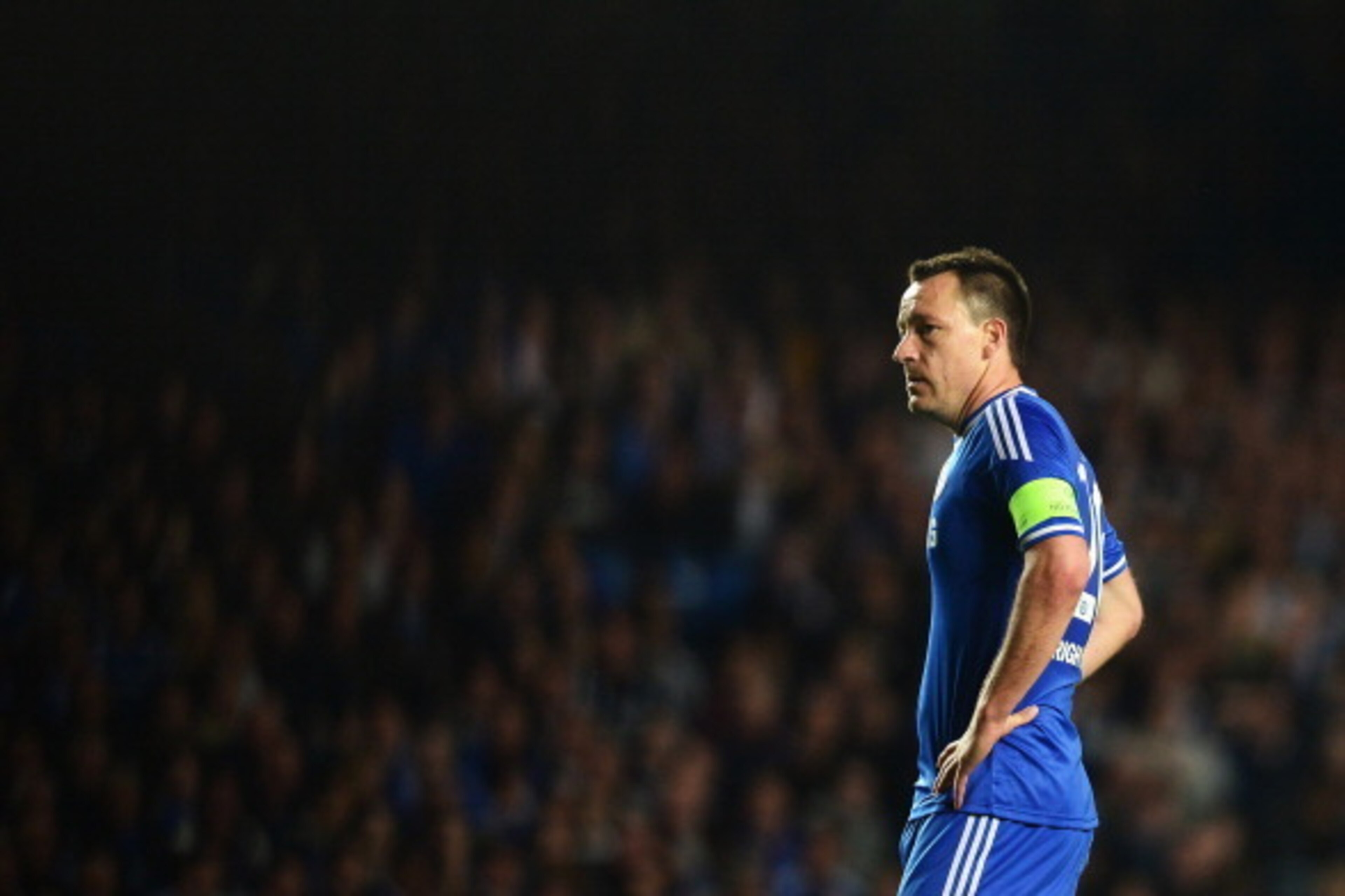 LONDON, ENGLAND - APRIL 30:  John Terry of Chelsea looks dejected during the UEFA Champions League semi-final second leg match between Chelsea and Club Atletico de Madrid at Stamford Bridge on April 30, 2014 in London, England.  (Photo by Jamie McDonald/G