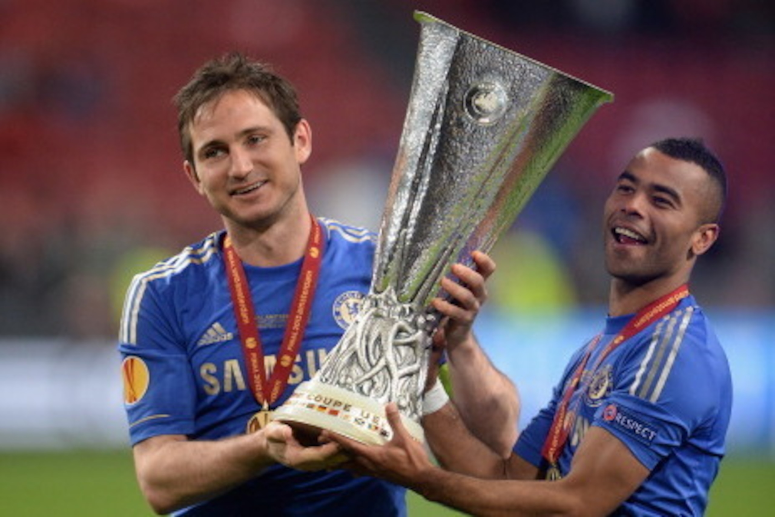 AMSTERDAM, NETHERLANDS - MAY 15:  Frank Lampard and Ashley Cole of Chelsea pose with the trophy during the UEFA Europa League Final between SL Benfica and Chelsea FC at Amsterdam Arena on May 15, 2013 in Amsterdam, Netherlands.  (Photo by Michael Regan/Ge