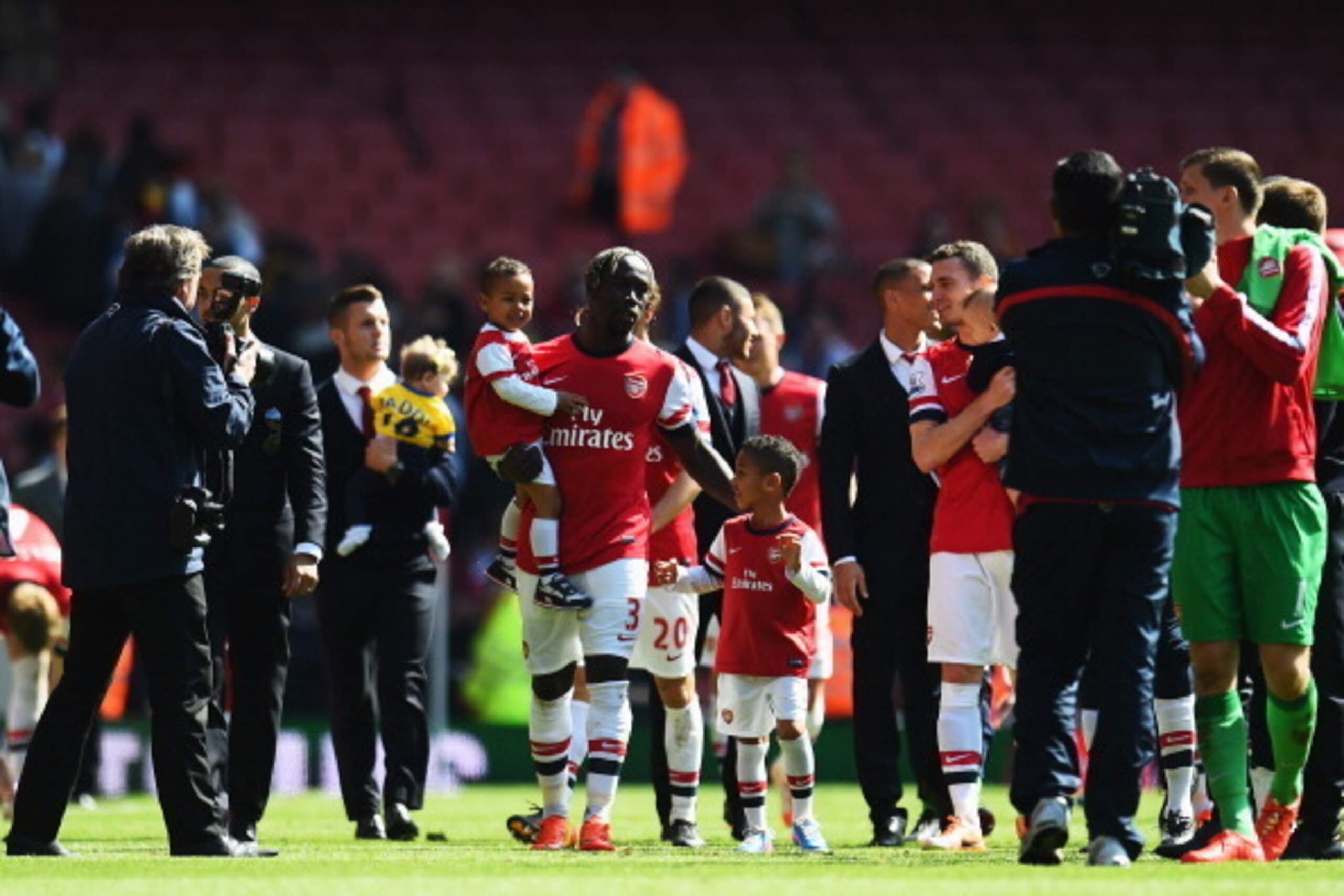 LONDON, ENGLAND - MAY 04:  Bacary Sagna of Arsenal applauds the fans with his family after the Barclays Premier League match between Arsenal and West Bromwich Albion at the Emirates Stadium on May 4, 2014 in London, England.  (Photo by Shaun Botterill/Get
