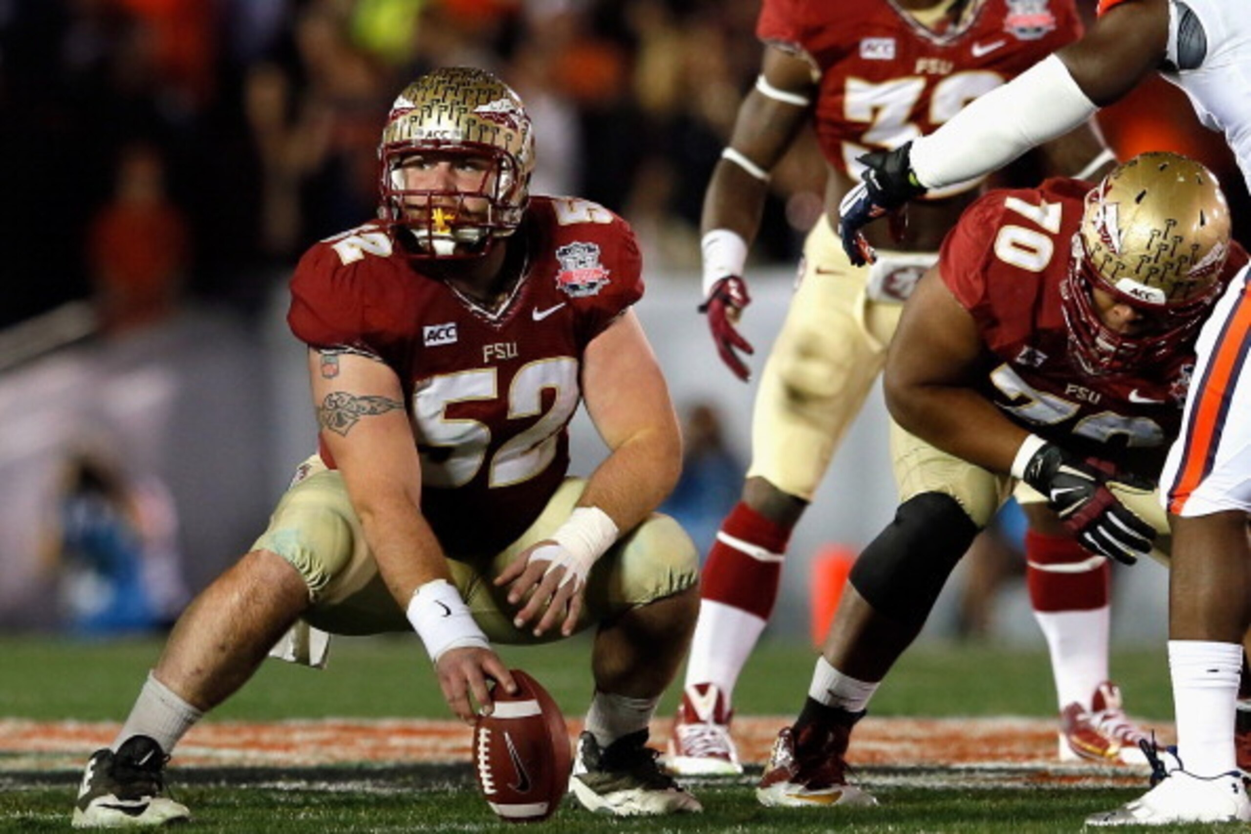 PASADENA, CA - JANUARY 06:  Offensive linesman Bryan Stork #52 of the Florida State Seminoles waits to snap the ball against the Auburn Tigers during the 2014 Vizio BCS National Championship Game at the Rose Bowl on January 6, 2014 in Pasadena, California