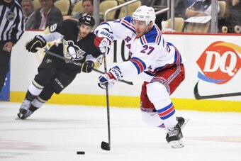 PITTSBURGH, PA - MAY 9:  Ryan McDonagh #27 of the New York Rangers passes the puck during the third period against the Pittsburgh Penguins in Game Five of the Second Round of the 2014 NHL Stanley Cup Playoffs on May 9, 2014 at CONSOL Energy Center in Pitt