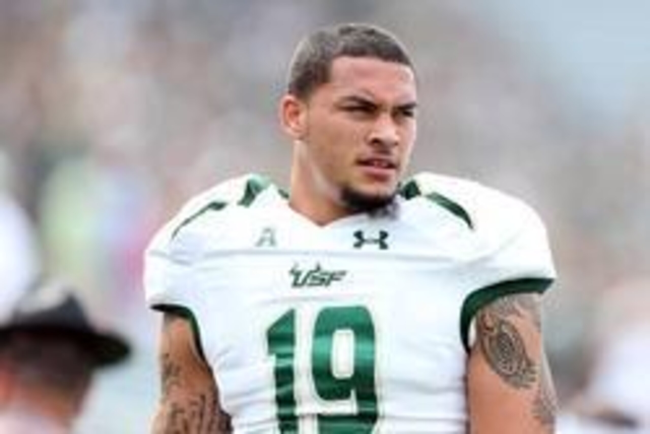 Sep 7, 2013; East Lansing, MI, USA; South Florida Bulls defensive lineman Aaron Lynch (19) looks on prior to a game  at Spartan Stadium. Mandatory Credit: Mike Carter-USA TODAY Sports
