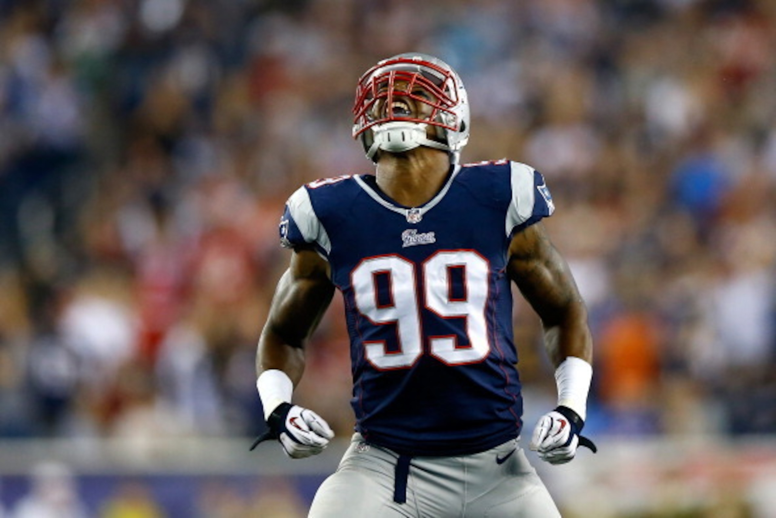 FOXBORO, MA - SEPTEMBER 12: Defensive end Michael Buchanan #99 of the New England Patriots celebrates after a sack in the second quarter against the New York Jets at Gillette Stadium on September 12, 2013 in Foxboro, Massachusetts. (Photo by Jared Wicke FOXBORO, MA - SEPTEMBER 12: Defensive end Michael Buchanan #99 of the New England Patriots celebrates after a sack in the second quarter against the New York Jets at Gillette Stadium on September 12, 2013 in Foxboro, Massachusetts. (Photo by Jared Wicke