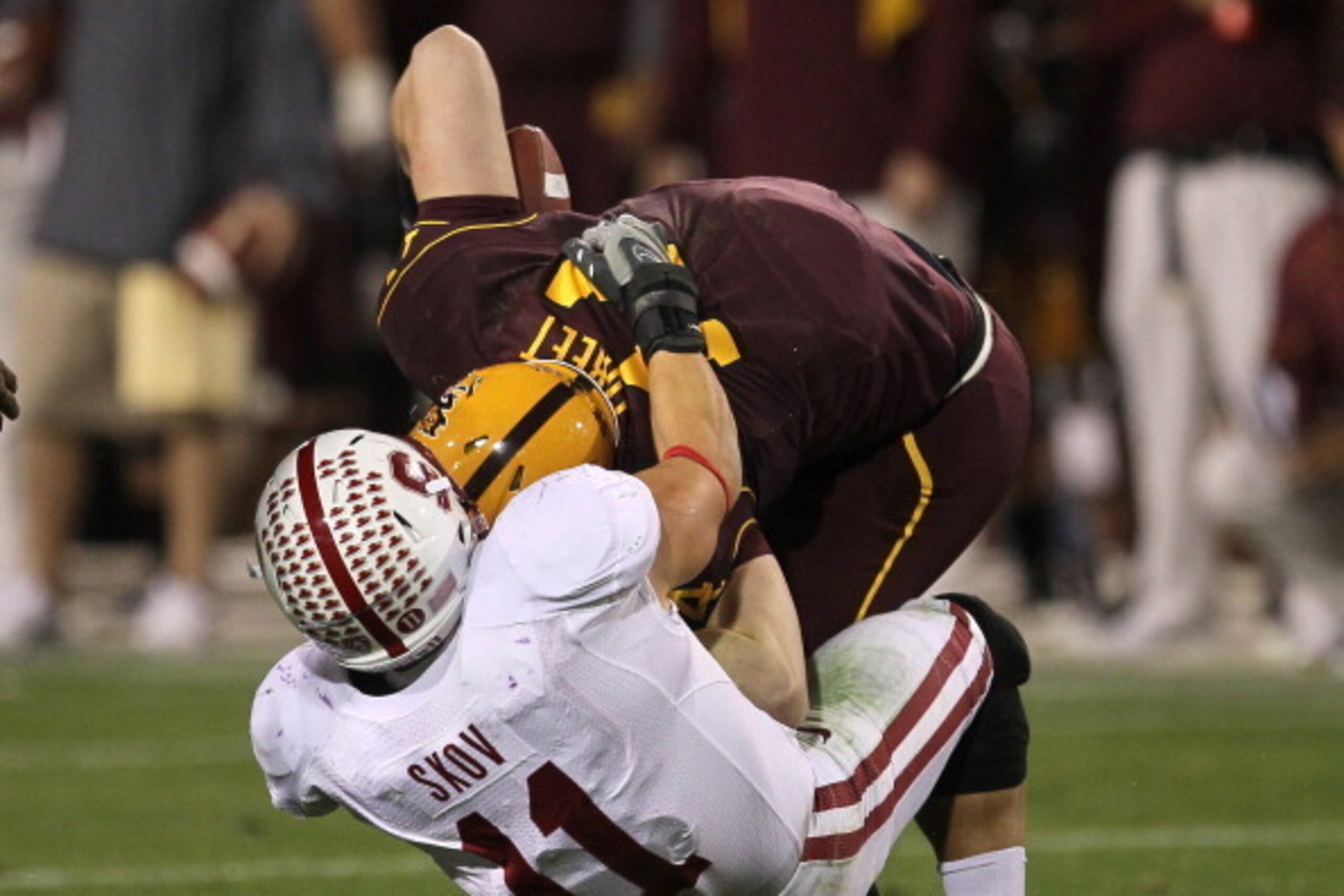TEMPE, AZ - NOVEMBER 13: Linebacker Shane Skov #11 of the Stanford Cardinal sacks quarterback Steven Threet #14 of the Arizona State Sun Devils to end the Sun Devils' final drive attempt in the fourth quarter at Sun Devil Stadium on November 13, 2010 in TEMPE, AZ - NOVEMBER 13: Linebacker Shane Skov #11 of the Stanford Cardinal sacks quarterback Steven Threet #14 of the Arizona State Sun Devils to end the Sun Devils' final drive attempt in the fourth quarter at Sun Devil Stadium on November 13, 2010 in