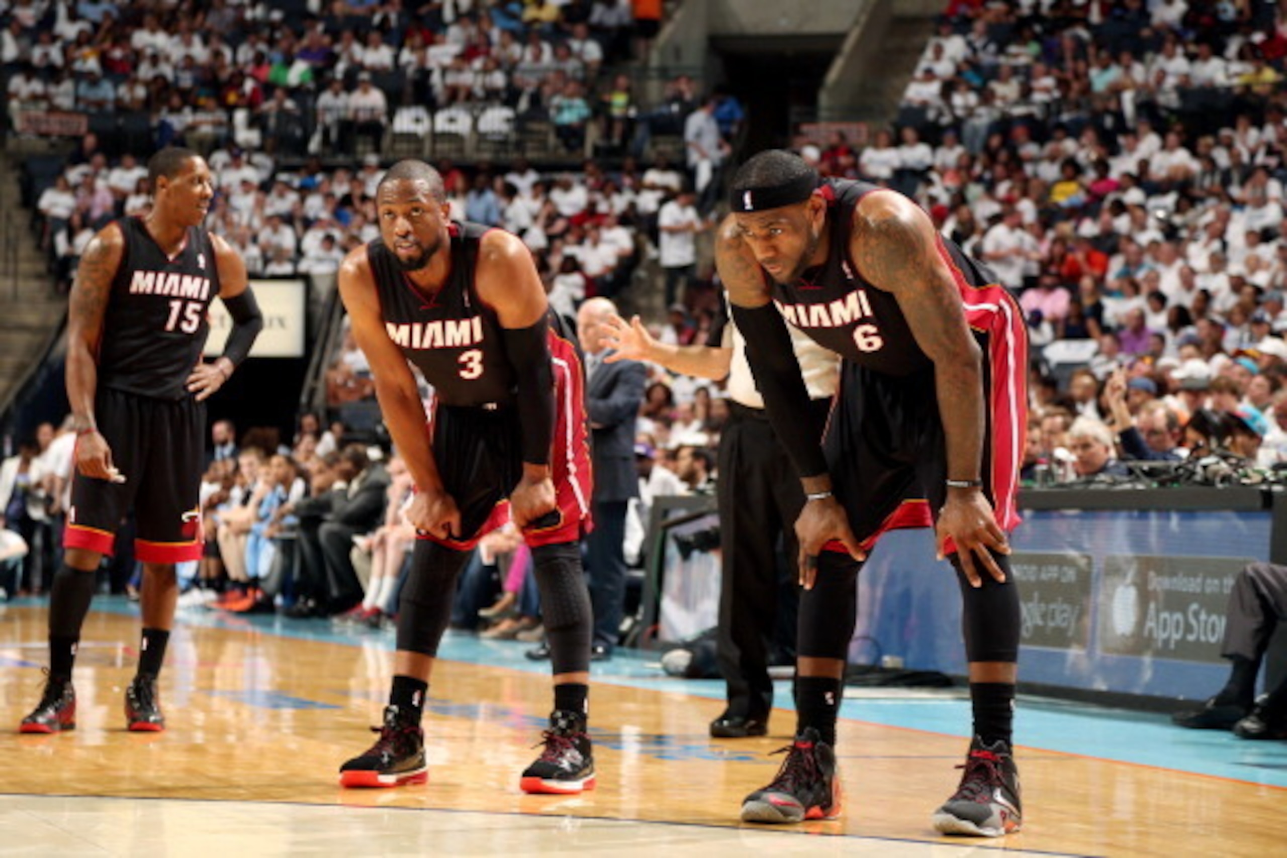 CHARLOTTE, NC - APRIL 26: Dwyane Wade #3 and LeBron James #6 of the Miami Heat stand on the court during a game against the Charlotte Bobcats in Game Three of the Eastern Conference Quarterfinals of the 2014 NBA playoffs at the Time Warner Cable Arena on 