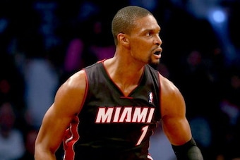 NEW YORK, NY - MAY 10:  Chris Bosh #1 of the Miami Heat celebrates his basket in the first half against the Brooklyn Nets in Game Three of the Eastern Conference Semifinals during the 2014 NBA Playoffs at the Barclays Center on May 10, 2014 in the Brookly