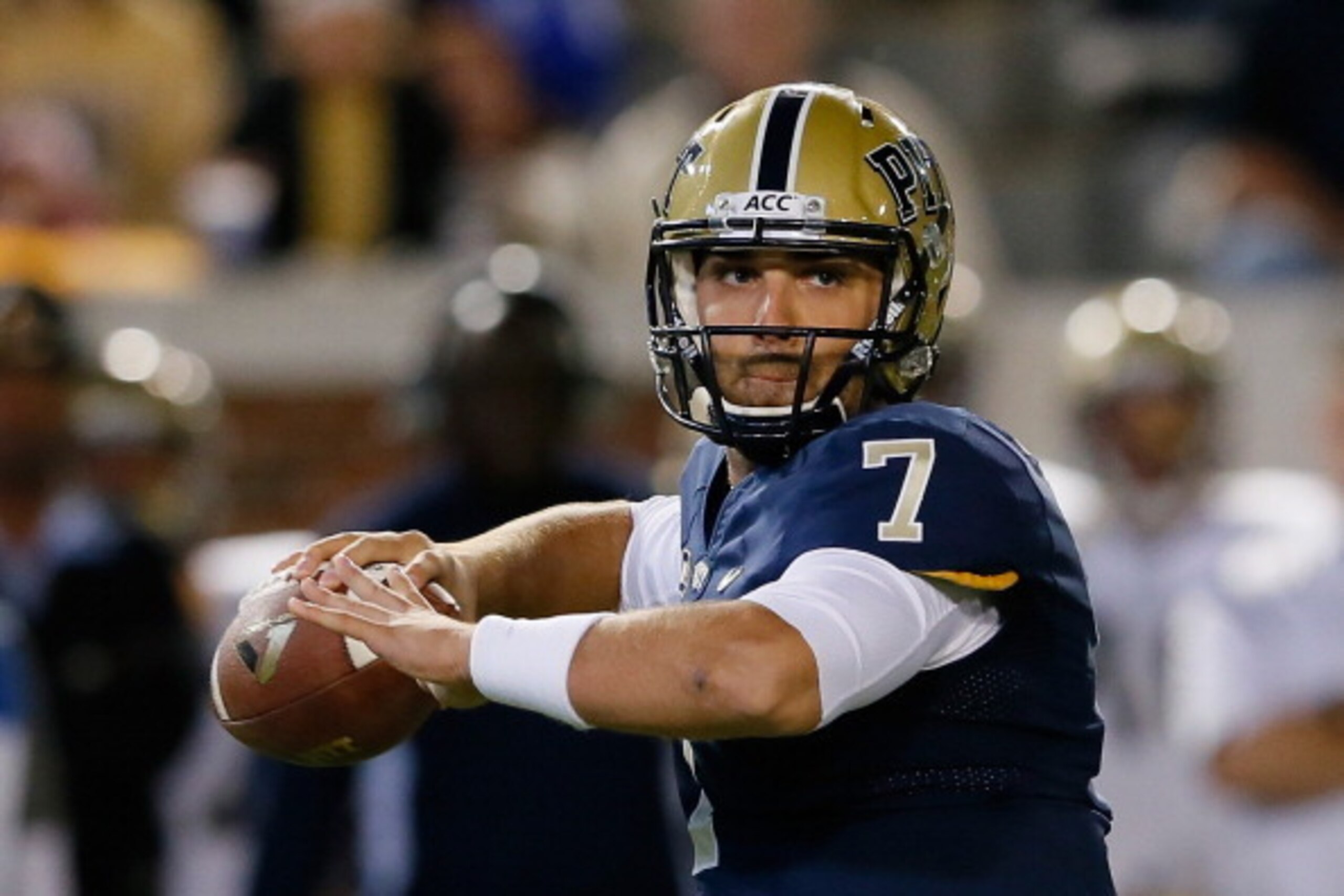 ATLANTA, GA - NOVEMBER 02:  Tom Savage #7 of the Pittsburgh Panthers looks to pass against the Georgia Tech Yellow Jackets at Bobby Dodd Stadium on November 2, 2013 in Atlanta, Georgia.  (Photo by Kevin C. Cox/Getty Images)