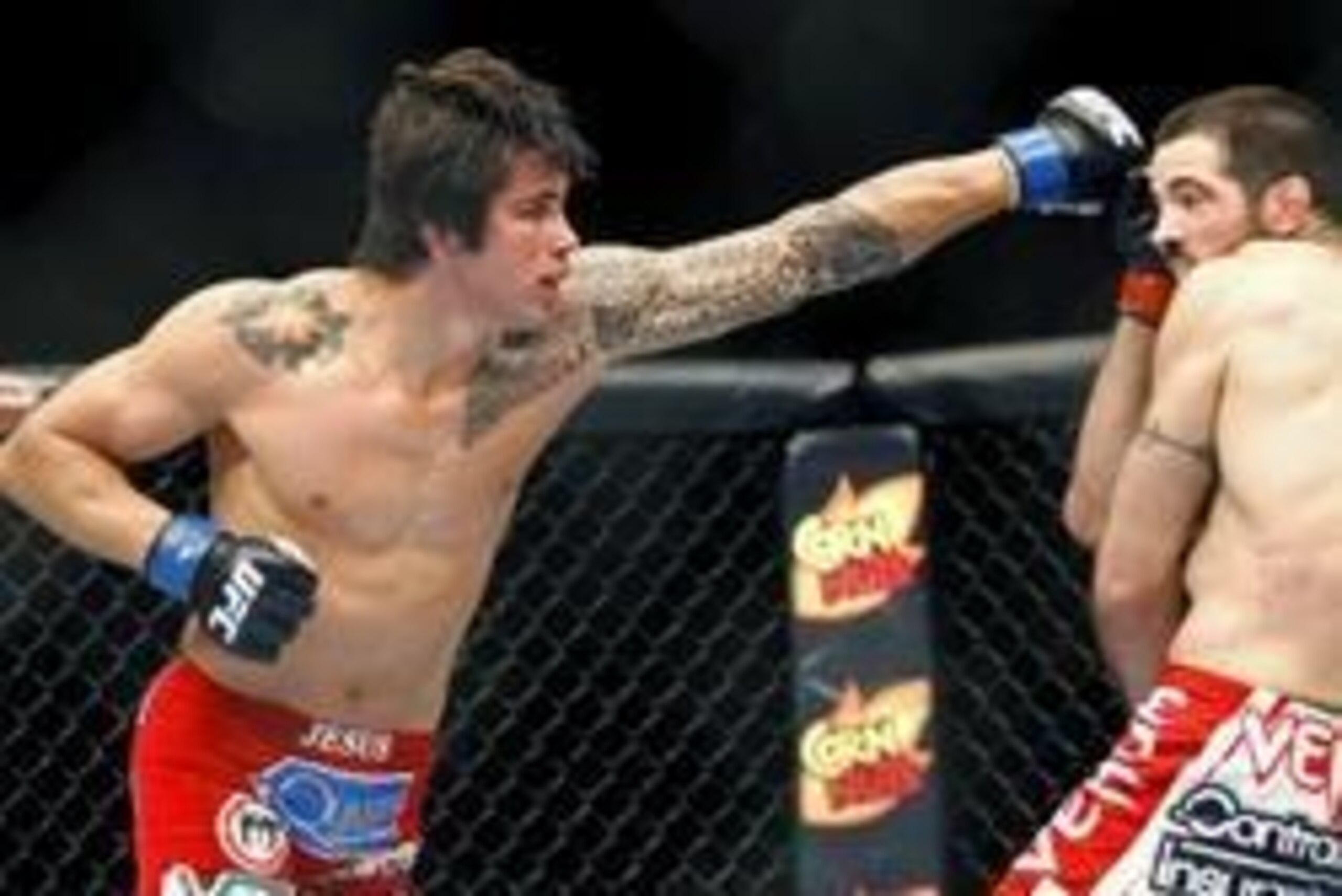 May 10, 2014; Cincinnati, OH, USA; Matt Brown (red gloves) fights Erick Silva (blue gloves) during a welterweight bout at US Bank Arena. Mandatory Credit: Joe Maiorana-USA TODAY Sports