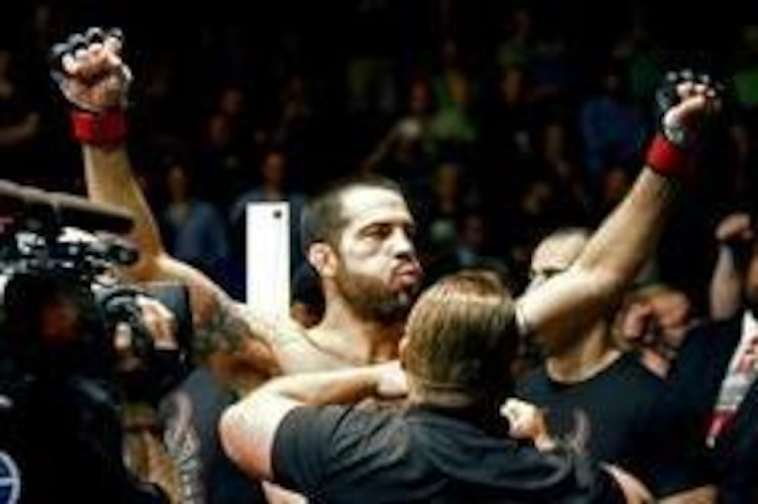 May 10, 2014; Cincinnati, OH, USA; Matt Brown (red gloves) prepares to enter the octagon for fight with Erick Silva (blue gloves) during a welterweight bout at US Bank Arena. Mandatory Credit: Joe Maiorana-USA TODAY Sports