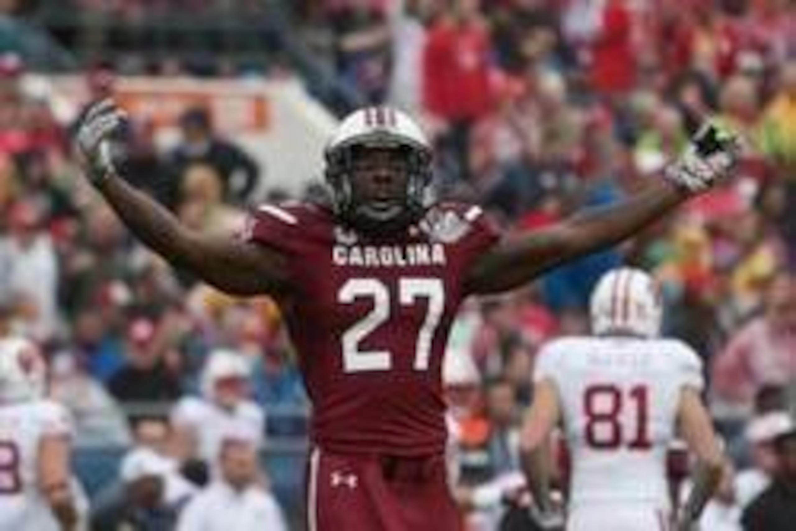 Jan 1, 2014; Orlando, FL, USA; South Carolina Gamecocks cornerback Victor Hampton (27) reacts during the first quarter of the Capital One Bowl against the Wisconsin Badgers held at the Florida Citrus Bowl. Mandatory Credit: Rob Foldy-USA TODAY Sports