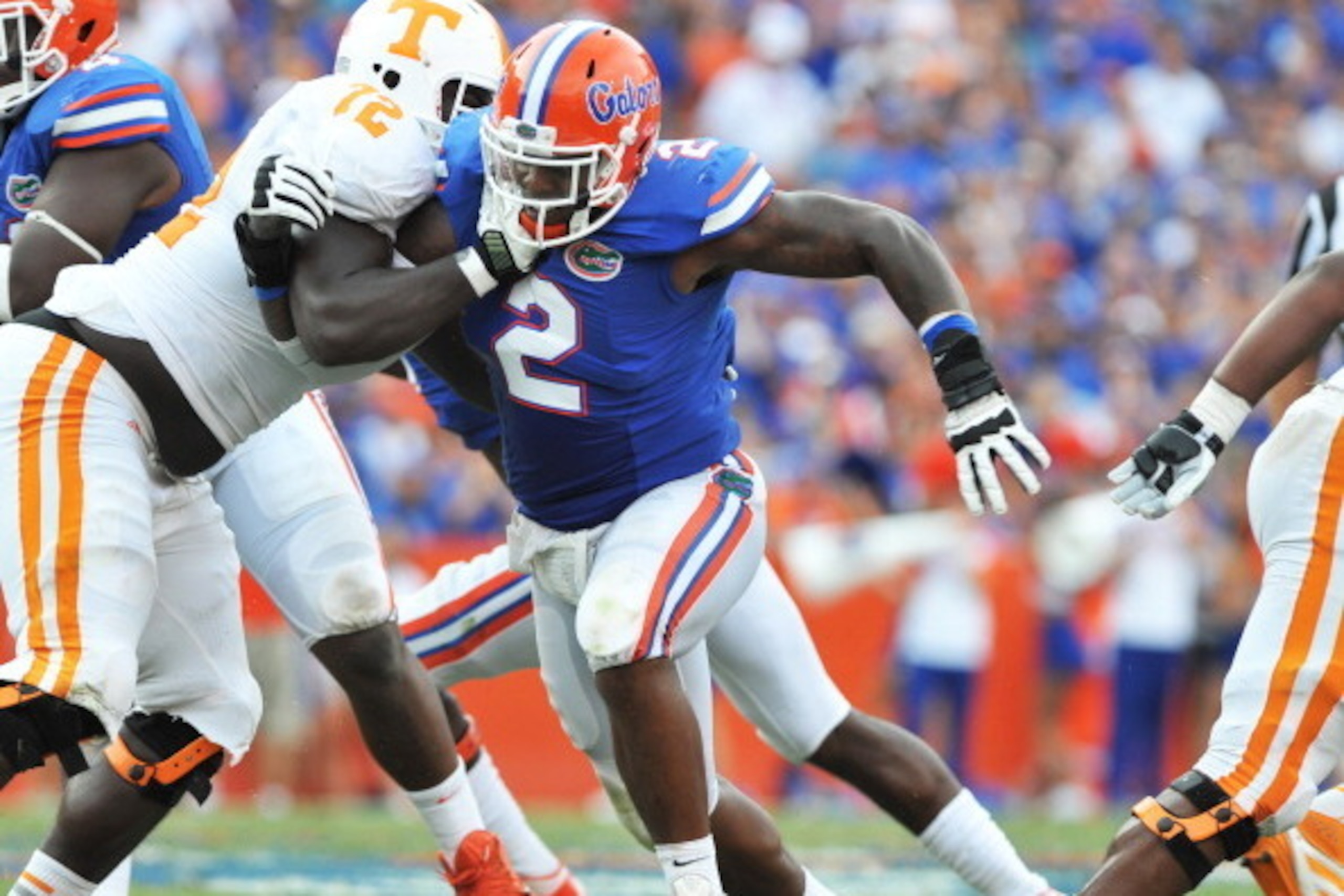 GAINESVILLE, FL - SEPTEMBER 21: Defensive lineman Dominique Easley #2 of the Florida Gators rushes upfield against Zach Fulton #72 of the Tennessee Volunteers September 21, 2013 at Ben Hill Griffin Stadium at Florida Field in Gainesville, Florida.  (Photo