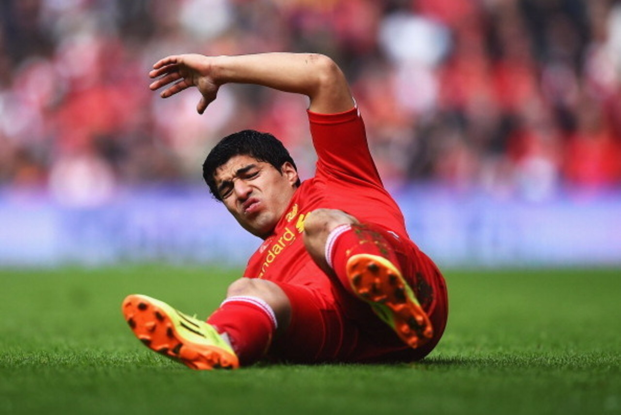 LIVERPOOL, ENGLAND - MAY 11:  Luis Suarez of Liverpool reacts during the Barclays Premier League match between Liverpool and Newcastle United at Anfield on May 11, 2014 in Liverpool, England.  (Photo by Laurence Griffiths/Getty Images)