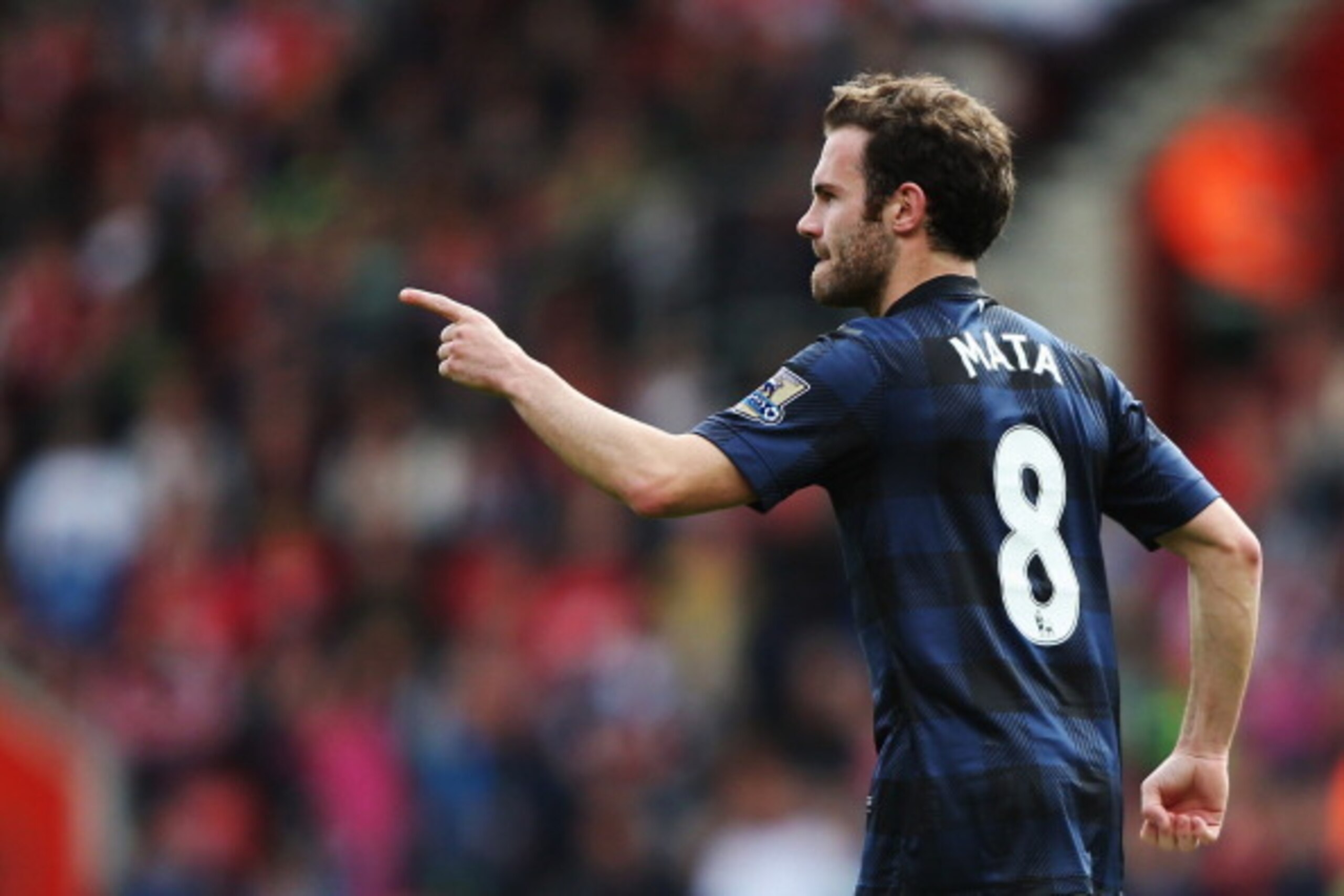 SOUTHAMPTON, ENGLAND - MAY 11:  Juan Mata of Manchester United celebrates scoring during the Barclays Premier League match between Southampton and Manchester United at St Mary's Stadium on May 11, 2014 in Southampton, England.  (Photo by Ian Walton/Getty 