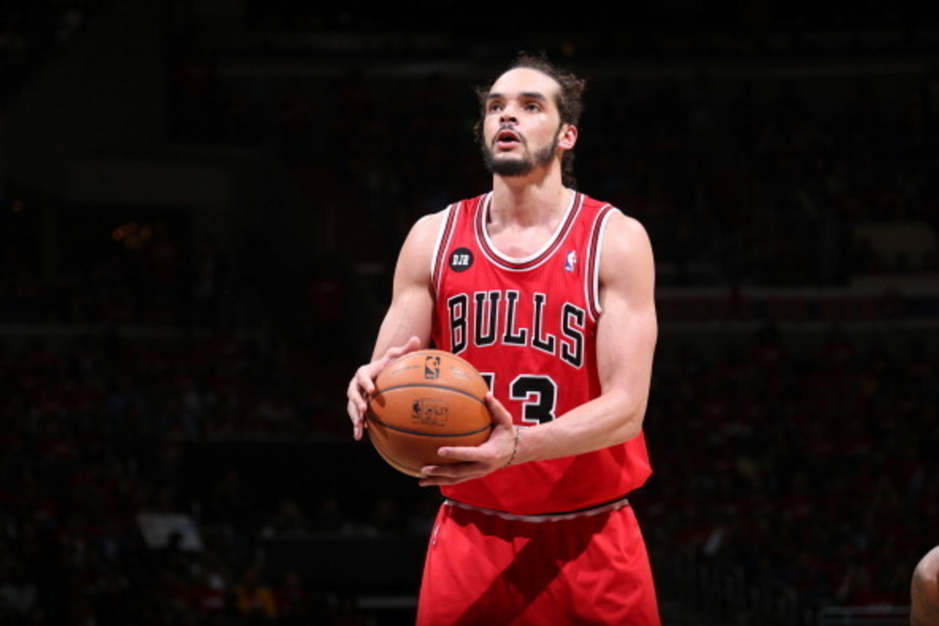 WASHINGTON, DC - APRIL 25: Joakim Noah #13 of the Chicago Bulls shoots a free throw in Game Three of the Eastern Conference Quarterfinals during the 2014 NBA Playoffs against the Washington Wizards at the Verizon Center on April 25, 2014 in Washington, DC