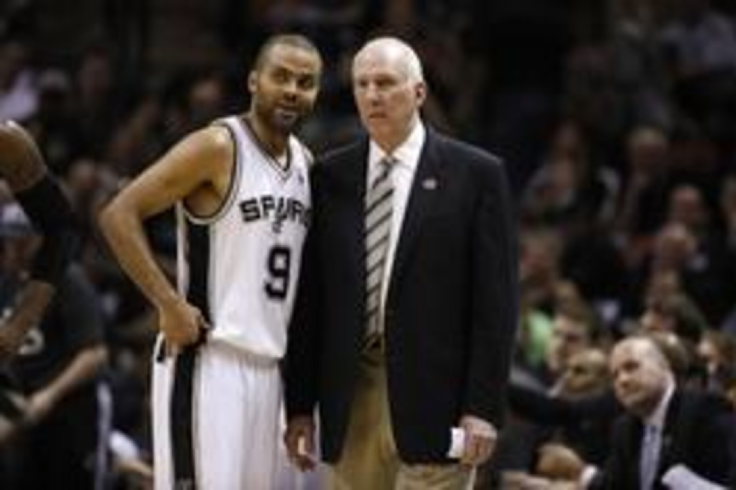 May 8, 2014; San Antonio, TX, USA; San Antonio Spurs guard Tony Parker (9) talks with head coach Gregg Popovich against the Portland Trail Blazers in game two of the second round of the 2014 NBA Playoffs at AT&T Center. Mandatory Credit: Soobum Im-USA TOD