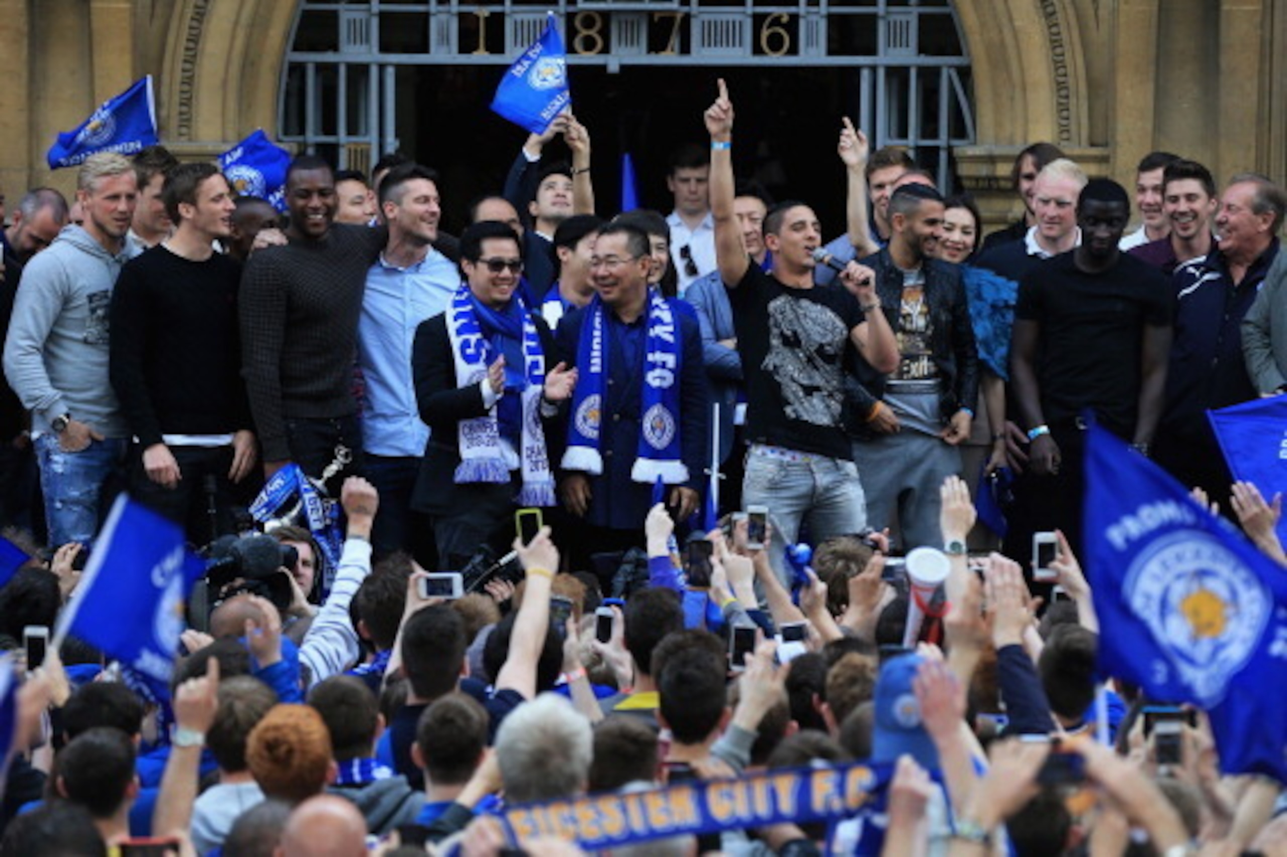 LEICESTER, ENGLAND - MAY 05:  Anthony Knockaert of Leicester City signs a song during a victory parade in honour of the football club winning the SkyBet Championship League trophy on May 5, 2014 in Leicester, England.  (Photo by Matthew Lewis/Getty Images
