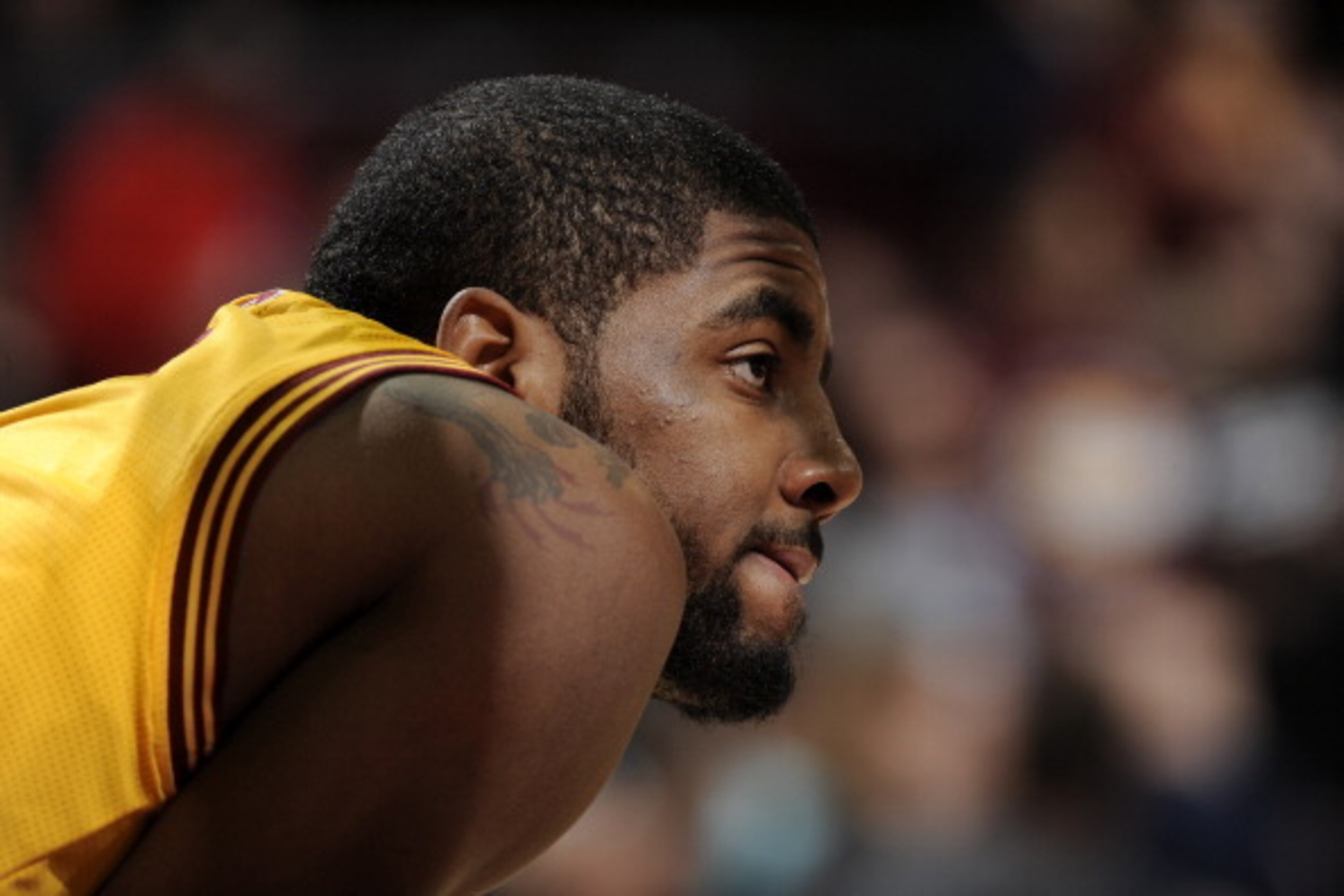 CLEVELAND, OH - APRIL 16:  Profile of Kyrie Irving #2 of the Cleveland Cavaliers during a break in the action against the Brooklyn Nets at The Quicken Loans Arena on April 16, 2014 in Cleveland, Ohio. NOTE TO USER: User expressly acknowledges and agrees t