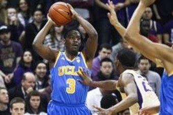 Mar 6, 2014; Seattle, WA, USA; UCLA Bruins guard Jordan Adams (3) holds the ball against the Washington Huskies during the first half at Alaska Airlines Arena at Hec Edmundson Pavilion. Mandatory Credit: Joe Nicholson-USA TODAY Sports