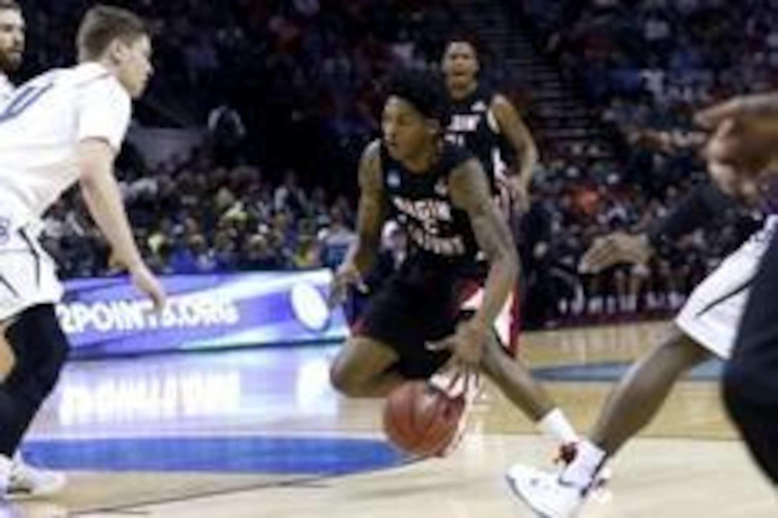 Mar 21, 2014; San Antonio, TX, USA; Louisiana Lafayette Ragin Cajuns guard Elfrid Payton (2) drives against Creighton Bluejays guard Grant Gibbs (10) in the first half of a men's college basketball game during the second round of the 2014 NCAA Tournament Mar 21, 2014; San Antonio, TX, USA; Louisiana Lafayette Ragin Cajuns guard Elfrid Payton (2) drives against Creighton Bluejays guard Grant Gibbs (10) in the first half of a men's college basketball game during the second round of the 2014 NCAA Tournament