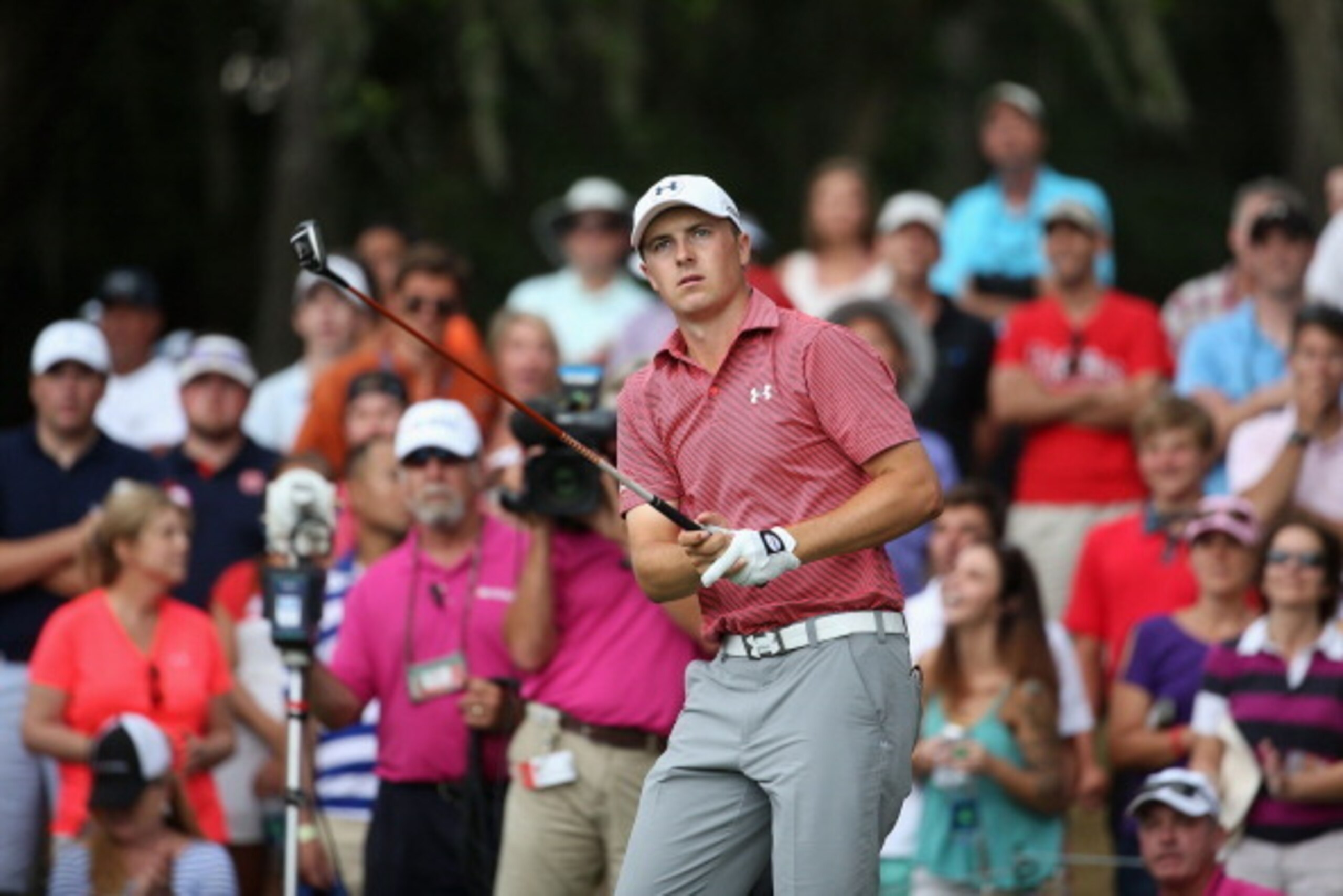 PONTE VEDRA BEACH, FL - MAY 11:  Jordan Spieth of the United States watches his tee shot on the 12th hole during the final round of THE PLAYERS Championship on The Stadium Course at TPC Sawgrass on May 11, 2014 in Ponte Vedra Beach, Florida.  (Photo by Ri