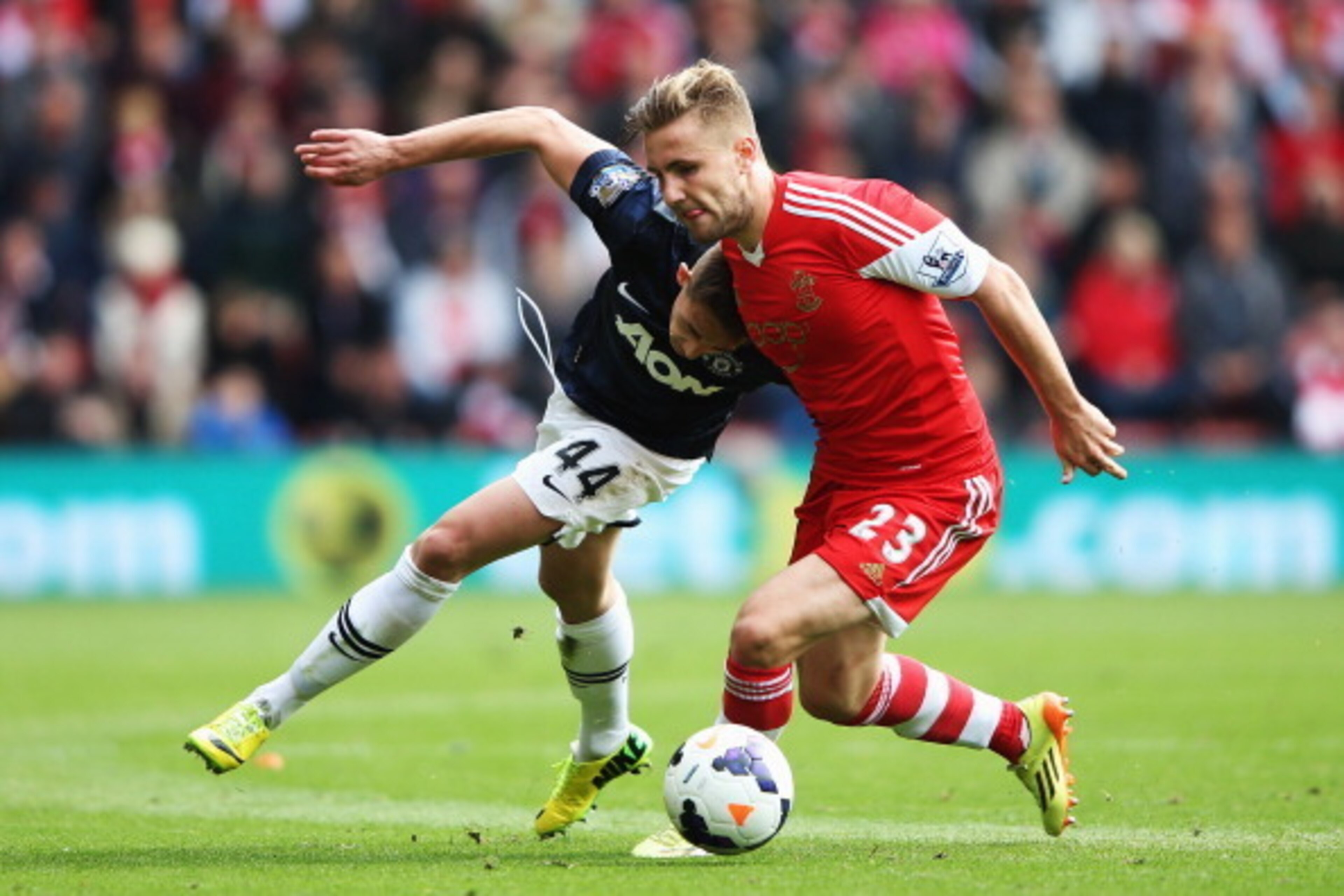SOUTHAMPTON, ENGLAND - MAY 11:  (L-R) Adnan Januzaj of Manchester United and Luke Shaw of Southampton challenge for the ball during the Barclays Premier League match between Southampton and Manchester United at St Mary's Stadium on May 11, 2014 in Southam