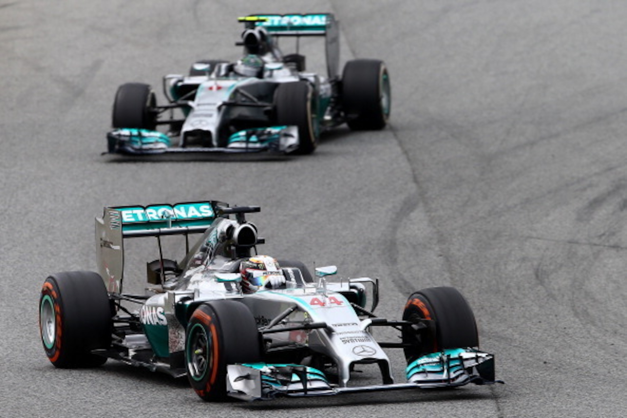 MONTMELO, SPAIN - MAY 11:  Lewis Hamilton of Great Britain and Mercedes GP leads Nico Rosberg of Germany and Mercedes GP during the Spanish Formula One Grand Prix at Circuit de Catalunya on May 11, 2014 in Montmelo, Spain.  (Photo by Clive Mason/Getty Ima