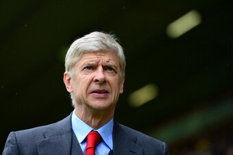 NORWICH, ENGLAND - MAY 11:  Arsene Wenger manager of Arsenal looks on during the Barclays Premier League match between Norwich City and Arsenal at Carrow Road on May 11, 2014 in Norwich, England.  (Photo by Jamie McDonald/Getty Images)