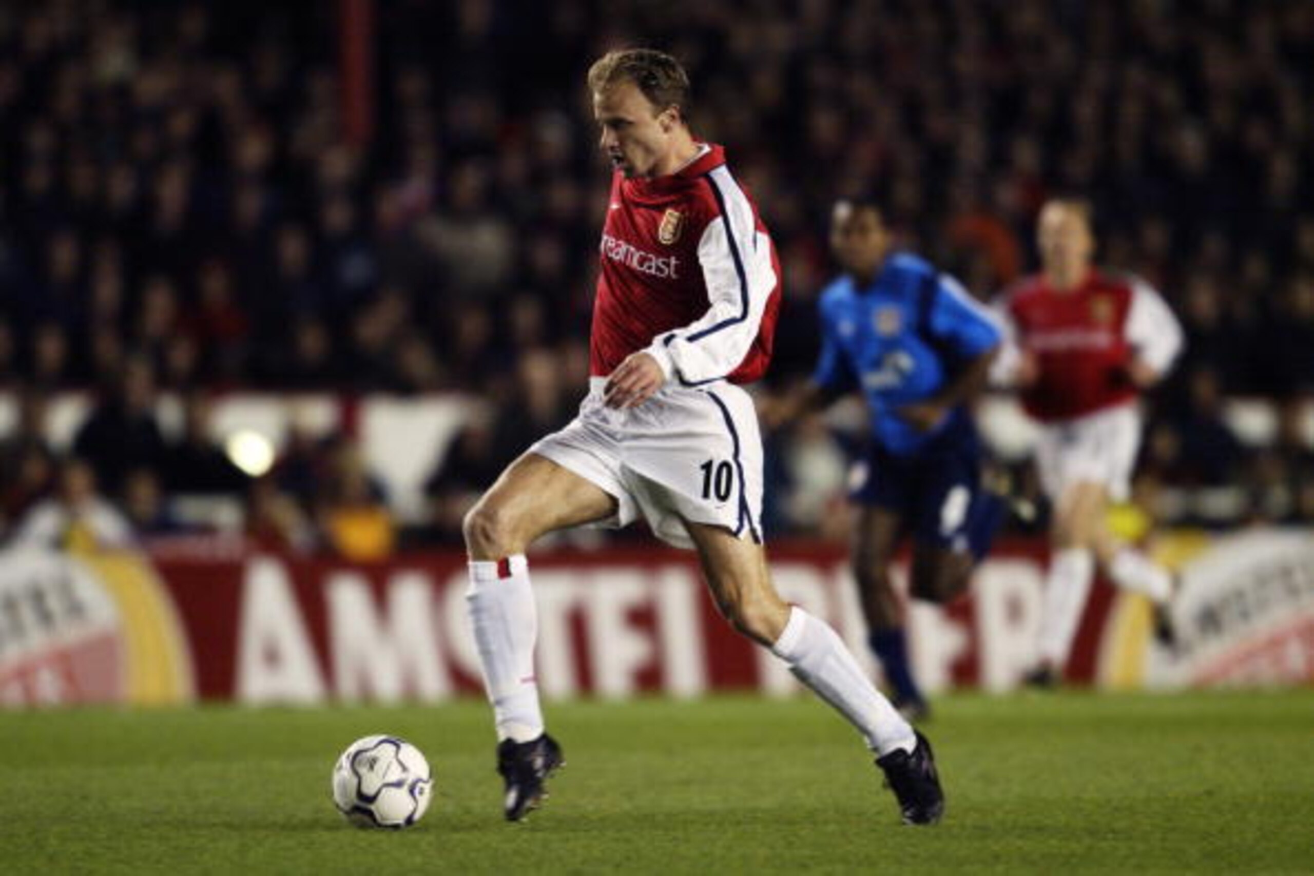 27 Feb 2002:  Dennis Bergkamp of Arsenal runs with the ball during the UEFA Champions League Second Stage Group D match between Arsenal and Bayer Leverkusen played at Highbury, in London. Arsenal won the match 4-1. DIGITAL IMAGE.  \ Mandatory Credit: Davi