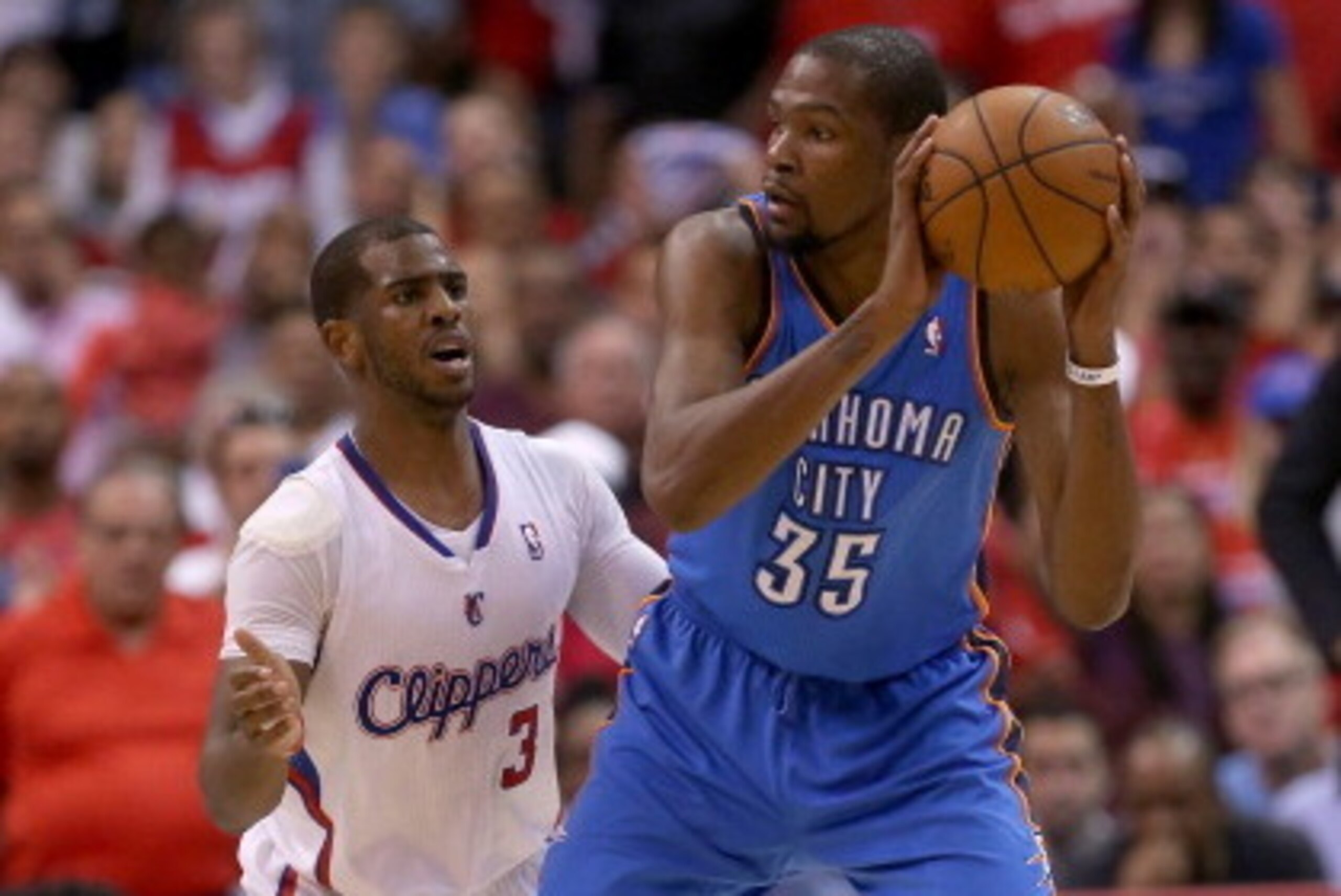 LOS ANGELES, CA - MAY 11:  Chris Paul #3 of the Los Angeles Clippers guards Kevin Durant #35 of the Oklahoma City Thunder during the fourth quarter of Game Four of the Western Conference Semifinals during the 2014 NBA Playoffs at Staples Center on May 11,