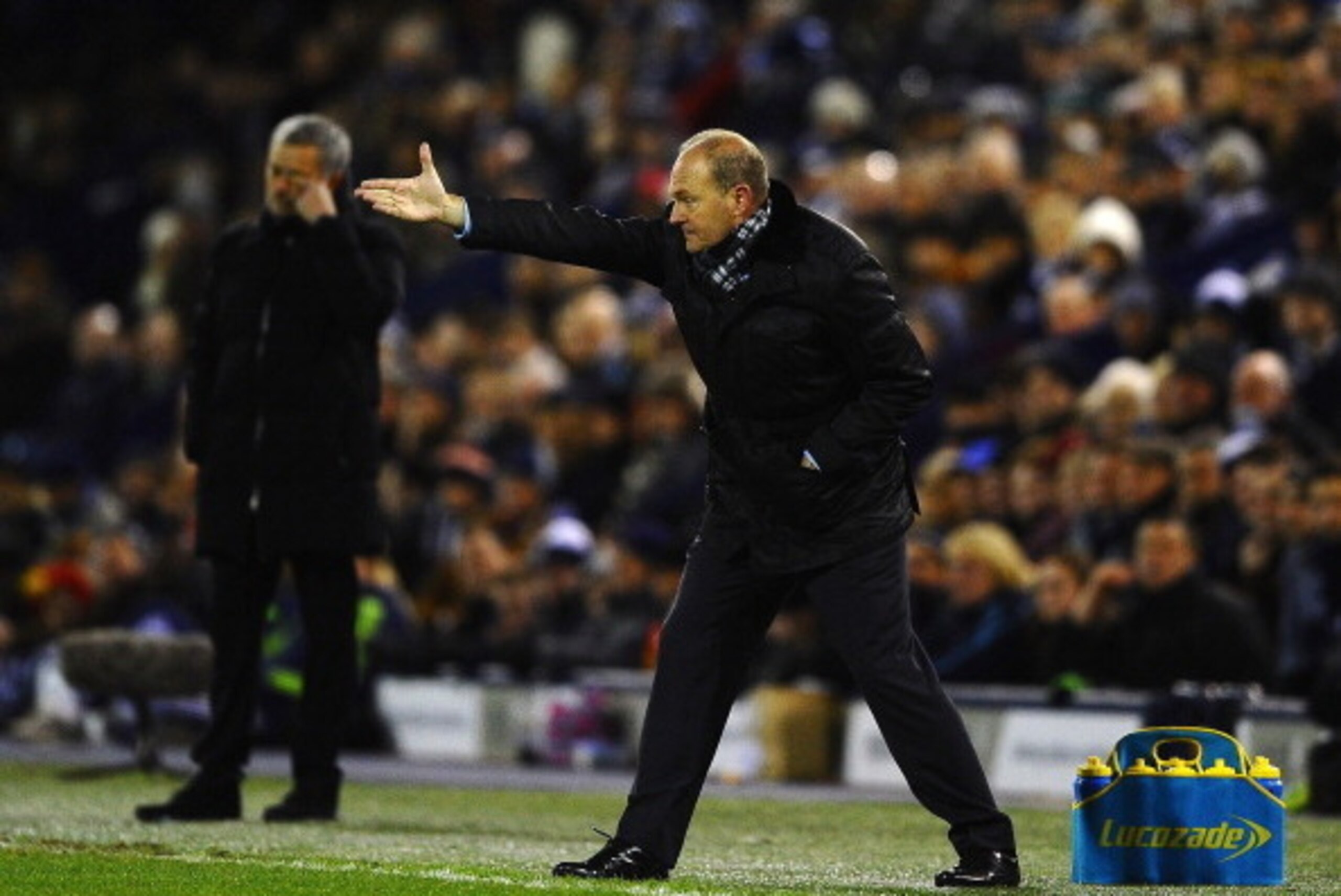 WEST BROMWICH, ENGLAND - FEBRUARY 11:  Manager Pepe Mel of West Brom gestures as Jose Mourinho of Chelsea looks on during the Barclays Premier League match between West Bromwich Albion and Chelsea at The Hawthorns on February 11, 2014 in West Bromwich, En