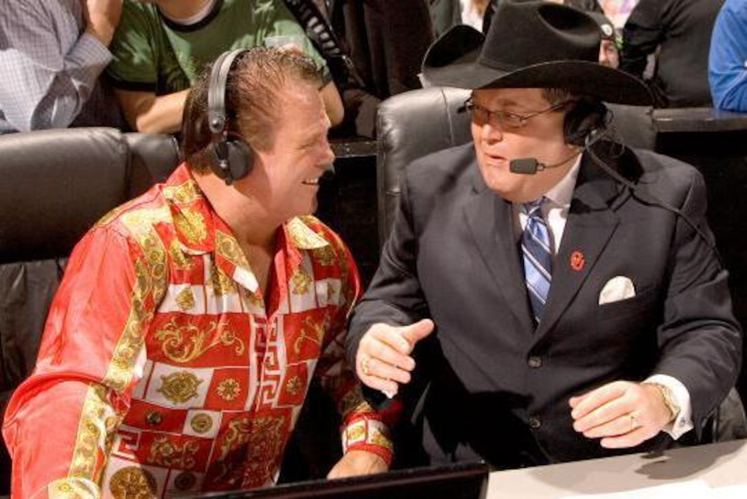 The King with longtime partner Jim Ross. The King with longtime partner Jim Ross.