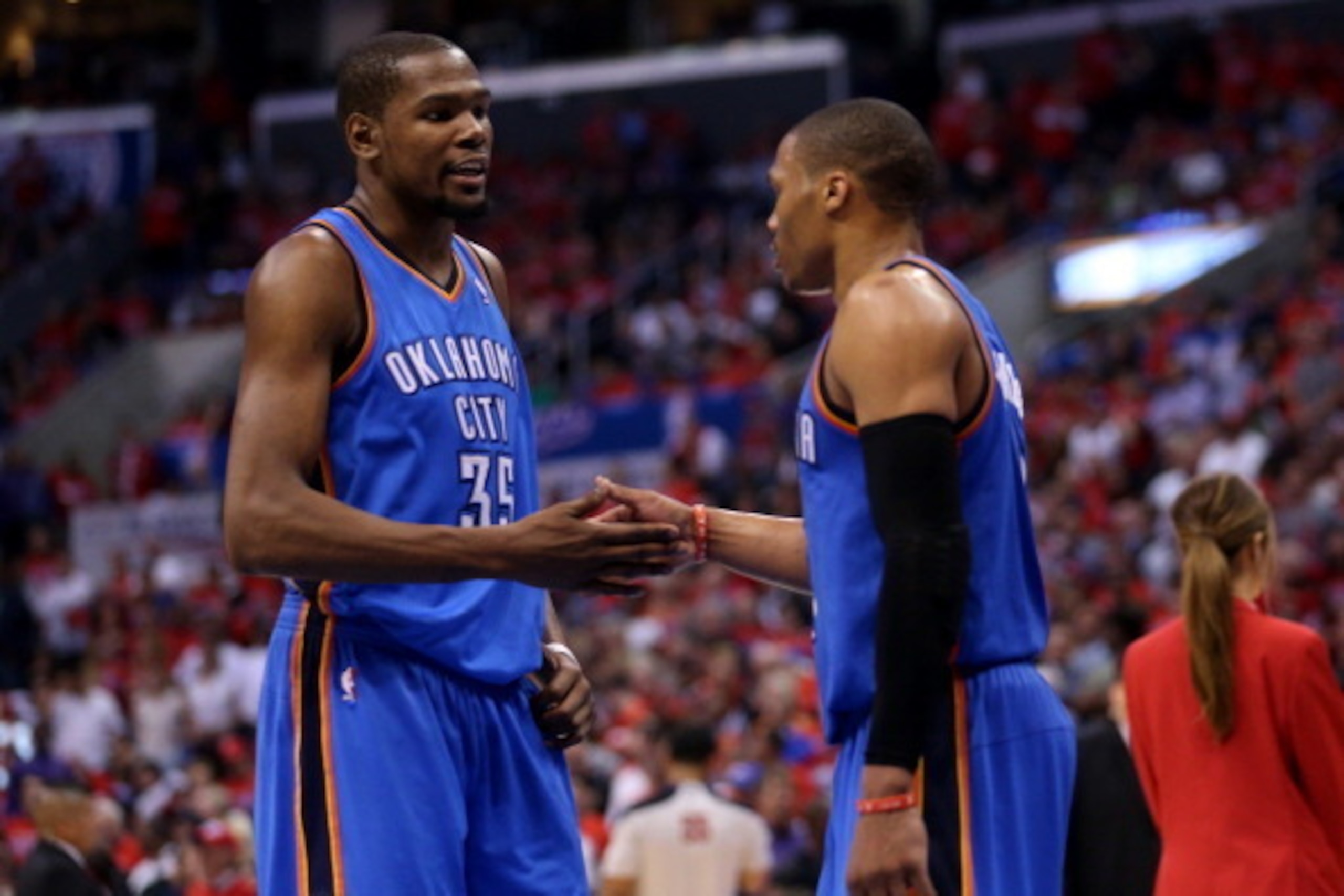 LOS ANGELES, CA - MAY 09:  Kevin Durant #35 and Russell Westbrook #0 of the Oklahoma City Thunder celebrate late in the game with the Los Angeles Clippers in Game Three of the Western Conference Semifinals during the 2014 NBA Playoffs at Staples Center on