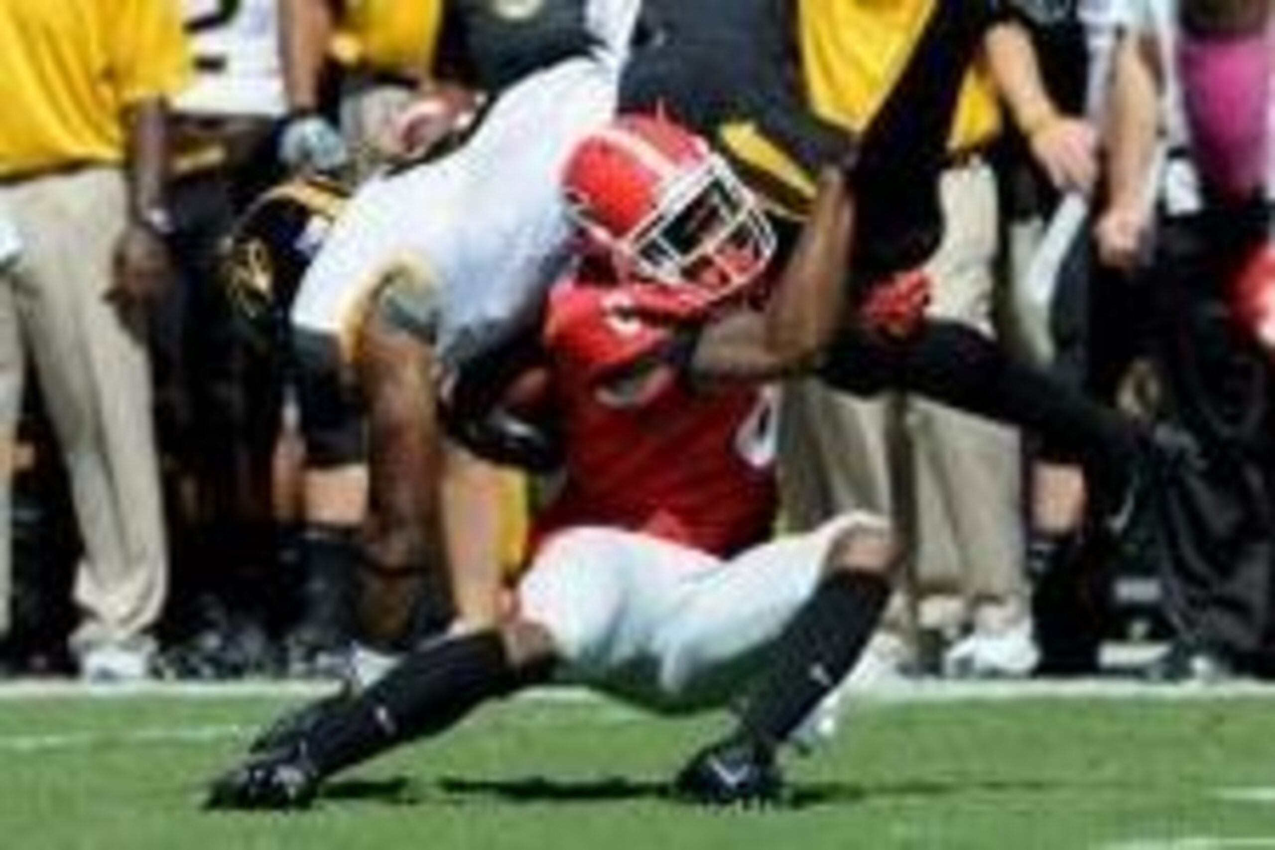 Oct 12, 2013; Athens, GA, USA; Georgia Bulldogs cornerback Shaq Wiggins (6) tackles Missouri Tigers running back Marcus Murphy (6) during the second quarter at Sanford Stadium. Mandatory Credit: Dale Zanine-USA TODAY Sports