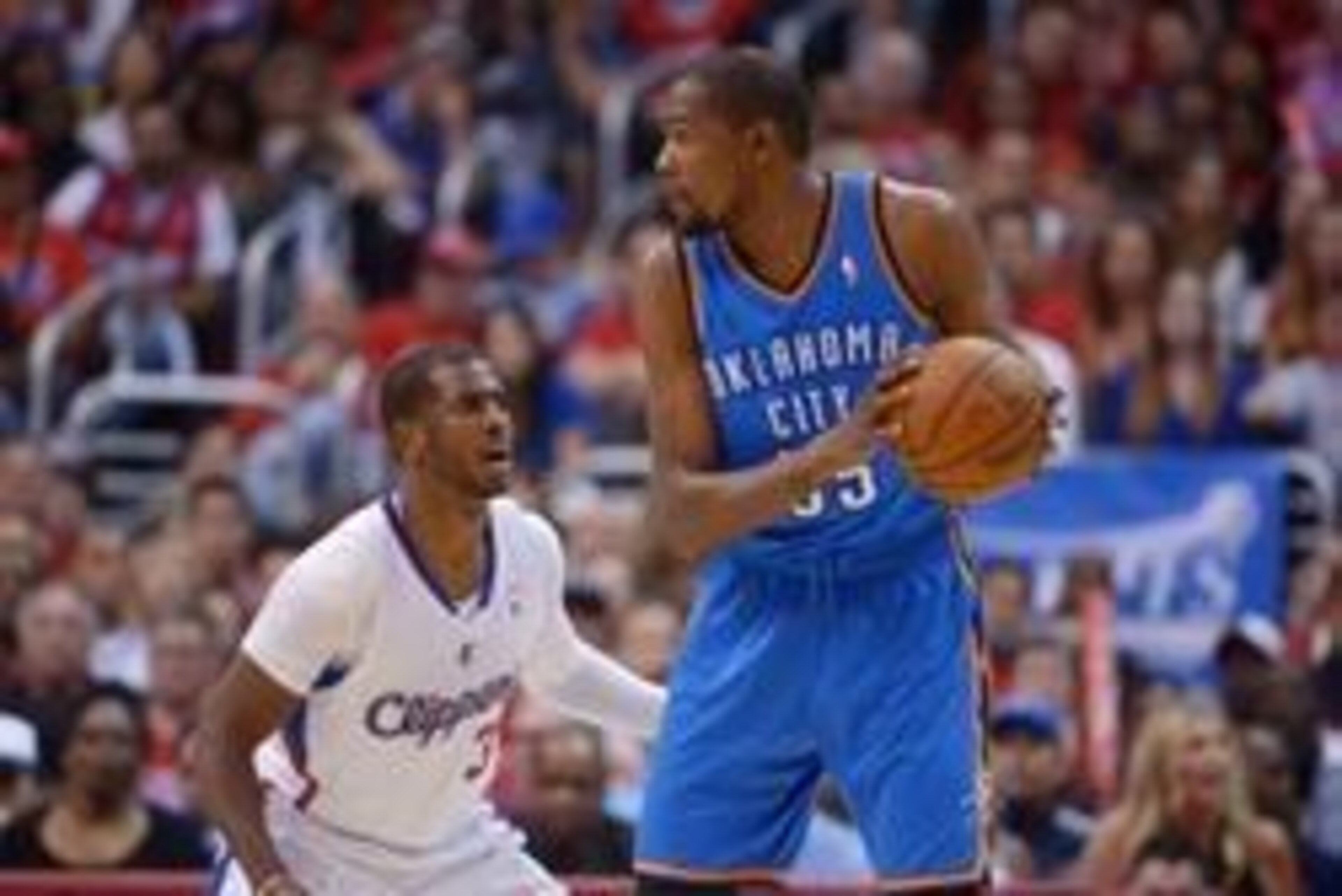 May 11, 2014; Los Angeles, CA, USA; Oklahoma City Thunder forward Kevin Durant (35) is defended by Los Angeles Clippers guard Chris Paul (3) in game four of the second round of the 2014 NBA Playoffs at Staples Center. The Clippers defeated the Thunder 101