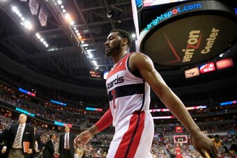 WASHINGTON, DC - MAY 09: John Wall #2 of the Washington Wizards walks off the court during halftime against the Indiana Pacers during Game 3 of the Eastern Conference Semifinals during the 2014 NBA Playoffs at Verizon Center on May 9, 2014 in Washington, 