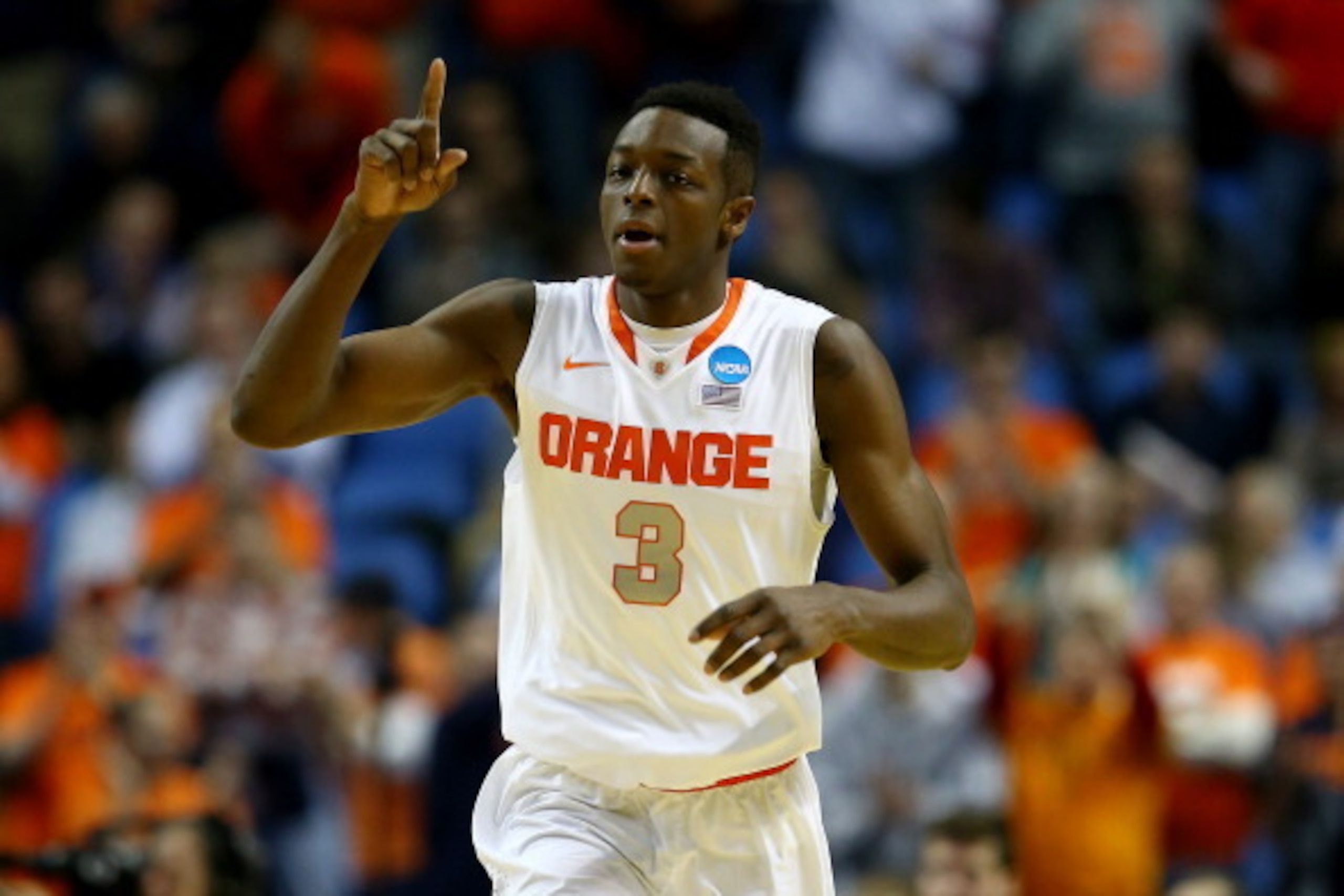 BUFFALO, NY - MARCH 20:  Jerami Grant #3 of the Syracuse Orange reacts against the Western Michigan Broncos during the second round of the 2014 NCAA Men's Basketball Tournament at the First Niagara Center on March 20, 2014 in Buffalo, New York.  (Photo by