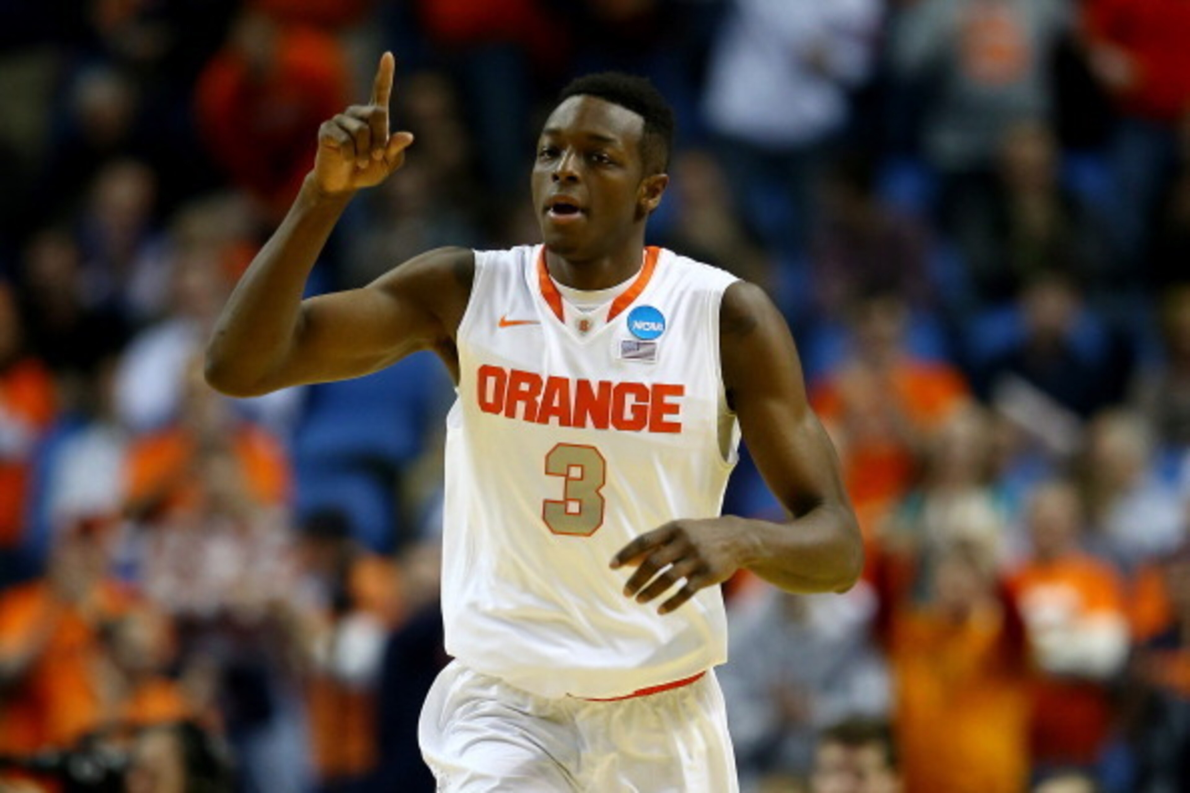 BUFFALO, NY - MARCH 20:  Jerami Grant #3 of the Syracuse Orange reacts against the Western Michigan Broncos during the second round of the 2014 NCAA Men's Basketball Tournament at the First Niagara Center on March 20, 2014 in Buffalo, New York.  (Photo by