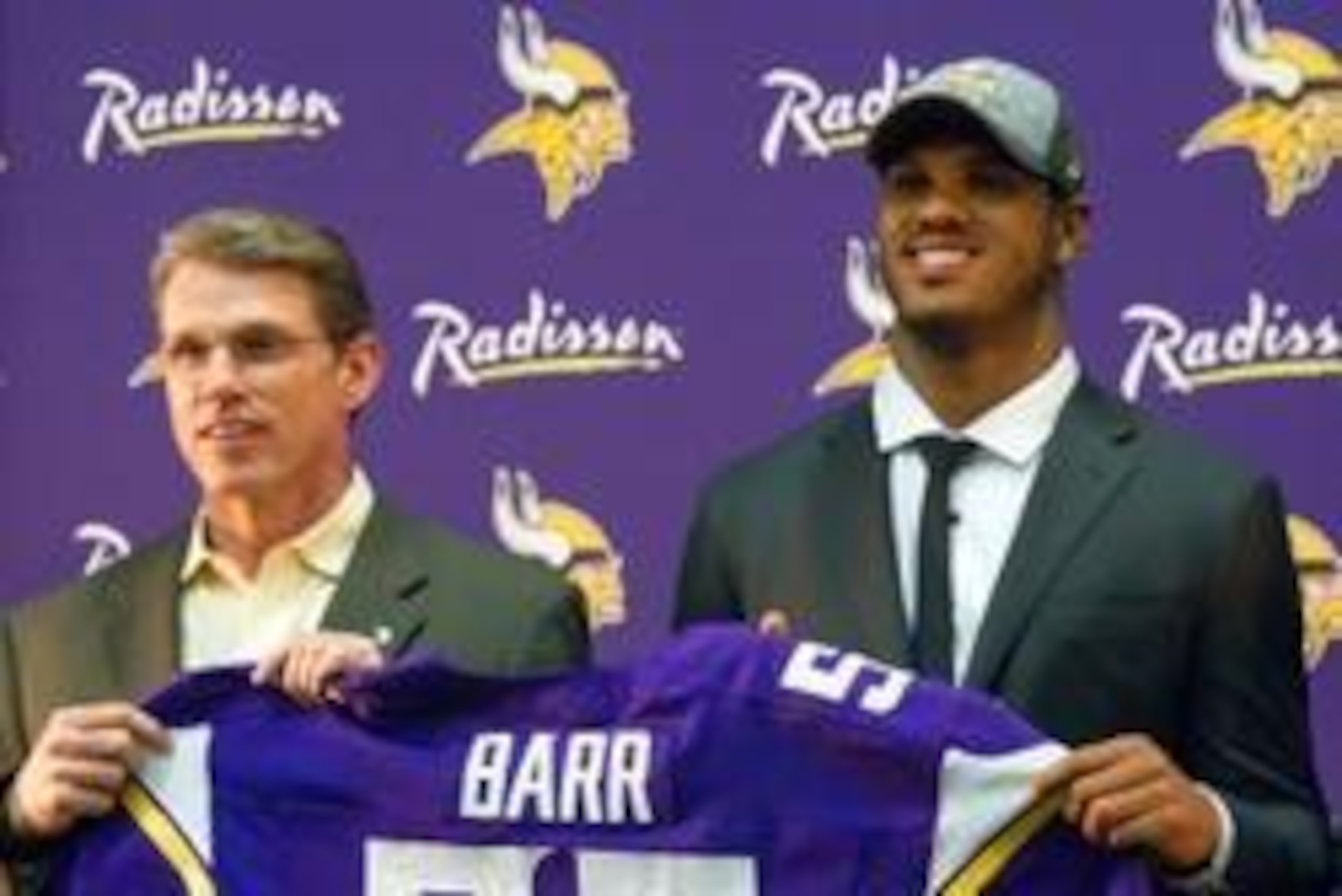 May 9, 2014; Eden Prairie, MN, USA; Minnesota Vikings general manager Rick Spielman (left) poses with linebacker Anthony Barr at Winter Park Fieldhouse. Mandatory Credit: Brad Rempel-USA TODAY Sports
