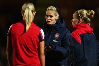 BARNET, ENGLAND - OCTOBER 04:  Arsenal Ladies Manager Shelley Kerr chats to her players during warm up for the FA WSL Continental Cup Final between Arsenal Ladies and Lincoln Ladies at The Hive on October 4, 2013 in Barnet, England.  (Photo by Bryn Lennon