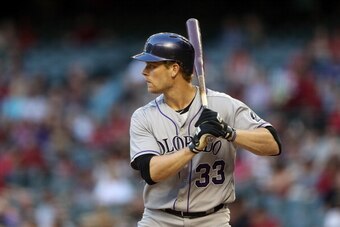 PHOENIX, AZ - APRIL 29:  Justin Morneau #33 of the Colorado Rockies bats against the Arizona Diamondbacks during the MLB game at Chase Field on April 29, 2014 in Phoenix, Arizona.   The Rockies defeated the Diamondbacks 5-4.  (Photo by Christian Petersen/
