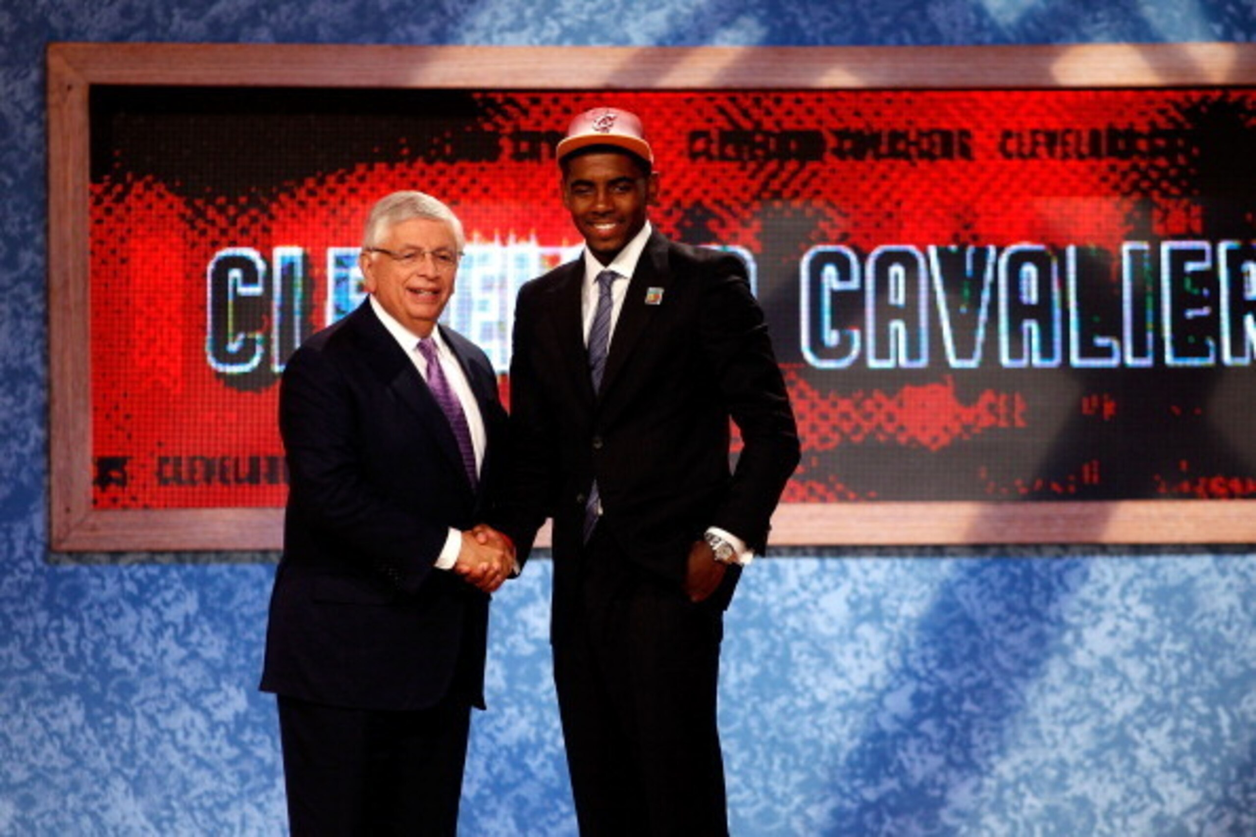 NEWARK, NJ - JUNE 23:  Kyrie Irving (R) from Duke greets NBA Commissioner David Stern after he was selected number one overall by the Cleveland Cavaliers in the first round during the 2011 NBA Draft at the Prudential Center on June 23, 2011 in Newark, New