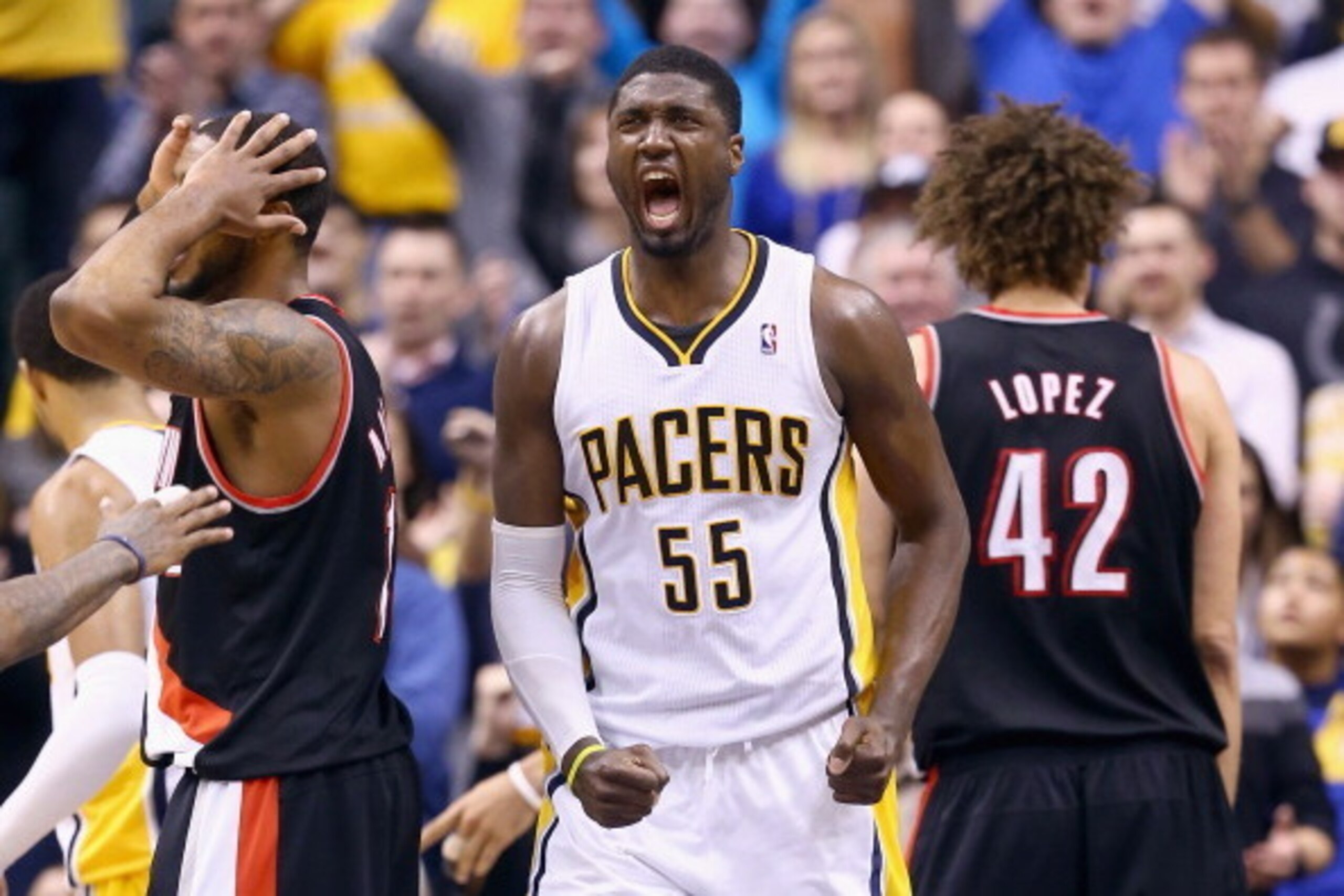INDIANAPOLIS, IN - FEBRUARY 07:  Roy Hibbert #55 of the Indiana Pacers  celebrates during overtime in the118-113 win over the Portland Trailblazers  at Bankers Life Fieldhouse on February 7, 2014 in Indianapolis, Indiana.  NOTE TO USER: User expressly ack