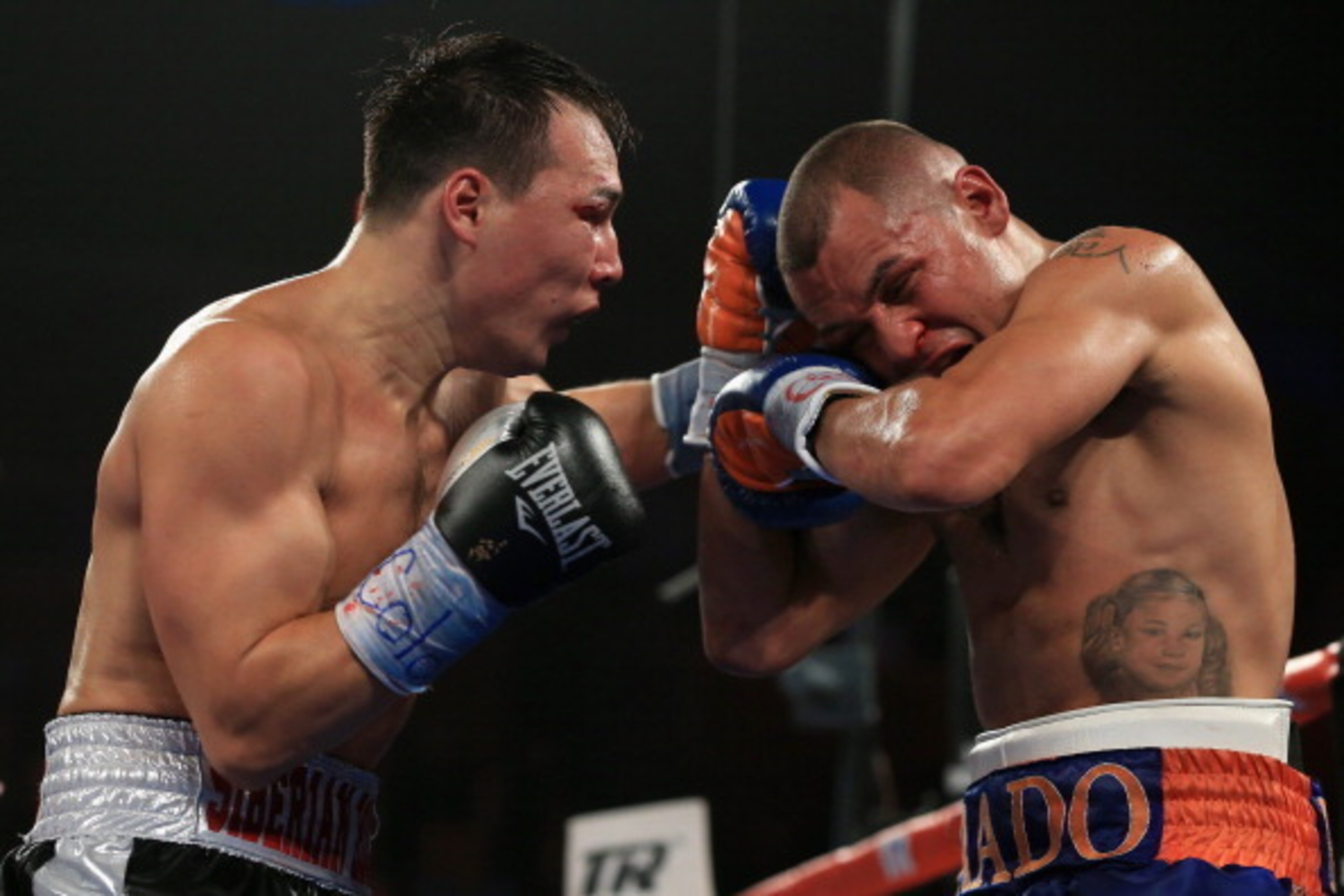 BROOMFIELD, CO - OCTOBER 19: Ruslan Provodnikov (L) of Russia delivers a punch to Mike Alvarado (R) as Provodnikov won their bout with a TKO in the 10th round to claim the WBO Junior Welterweight Title at the 1stBank Center on October 19, 2013 in Broomfi BROOMFIELD, CO - OCTOBER 19: Ruslan Provodnikov (L) of Russia delivers a punch to Mike Alvarado (R) as Provodnikov won their bout with a TKO in the 10th round to claim the WBO Junior Welterweight Title at the 1stBank Center on October 19, 2013 in Broomfi