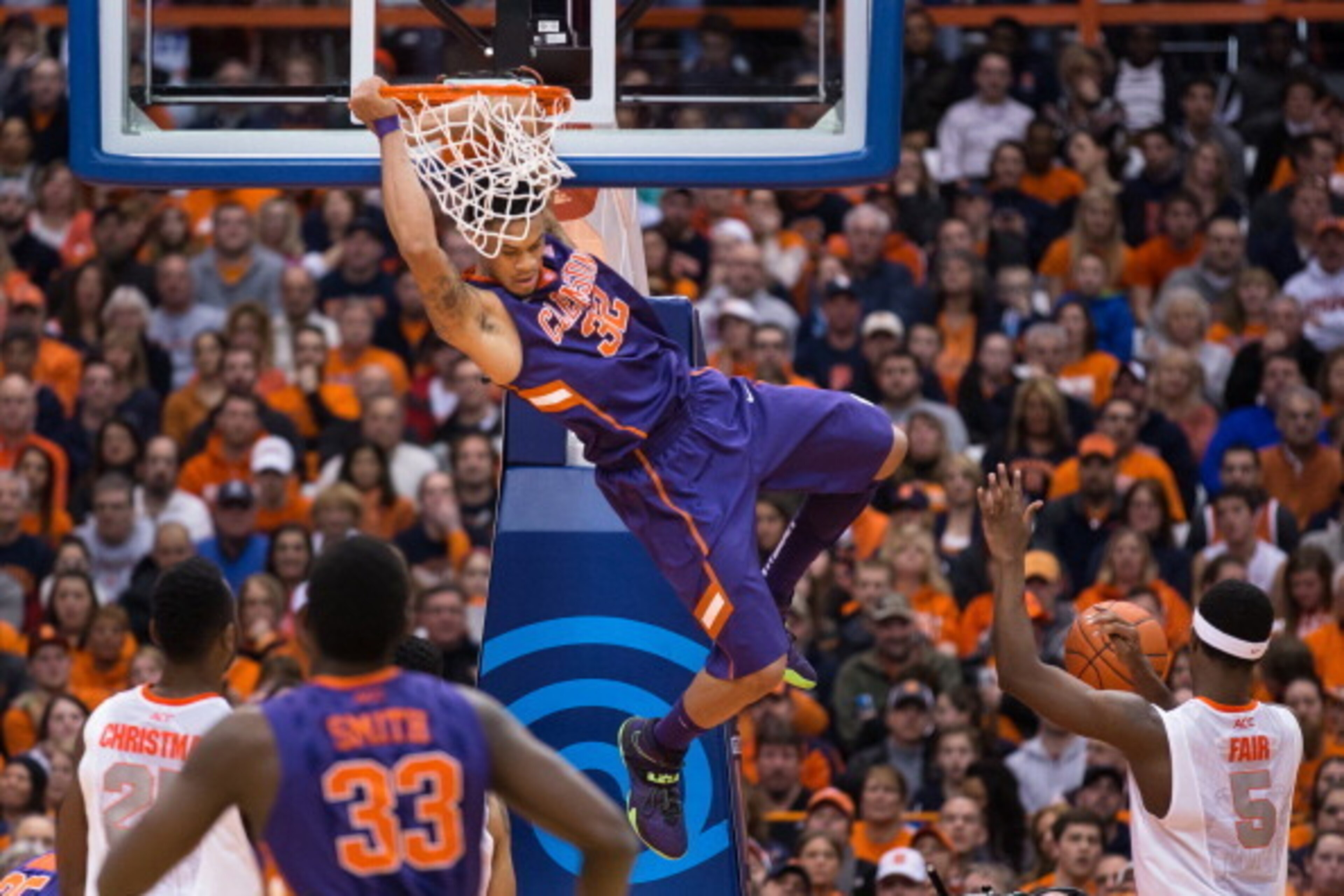 SYRACUSE, NY - FEBRUARY 9: K.J. McDaniels #32 of the Clemson Tigers slam dunks the ball during the second half against the Syracuse Orange on February 9, 2014 at The Carrier Dome in Syracuse, New York. Syracuse defeats Clemson 57-44. (Photo by Brett Car SYRACUSE, NY - FEBRUARY 9: K.J. McDaniels #32 of the Clemson Tigers slam dunks the ball during the second half against the Syracuse Orange on February 9, 2014 at The Carrier Dome in Syracuse, New York. Syracuse defeats Clemson 57-44. (Photo by Brett Car