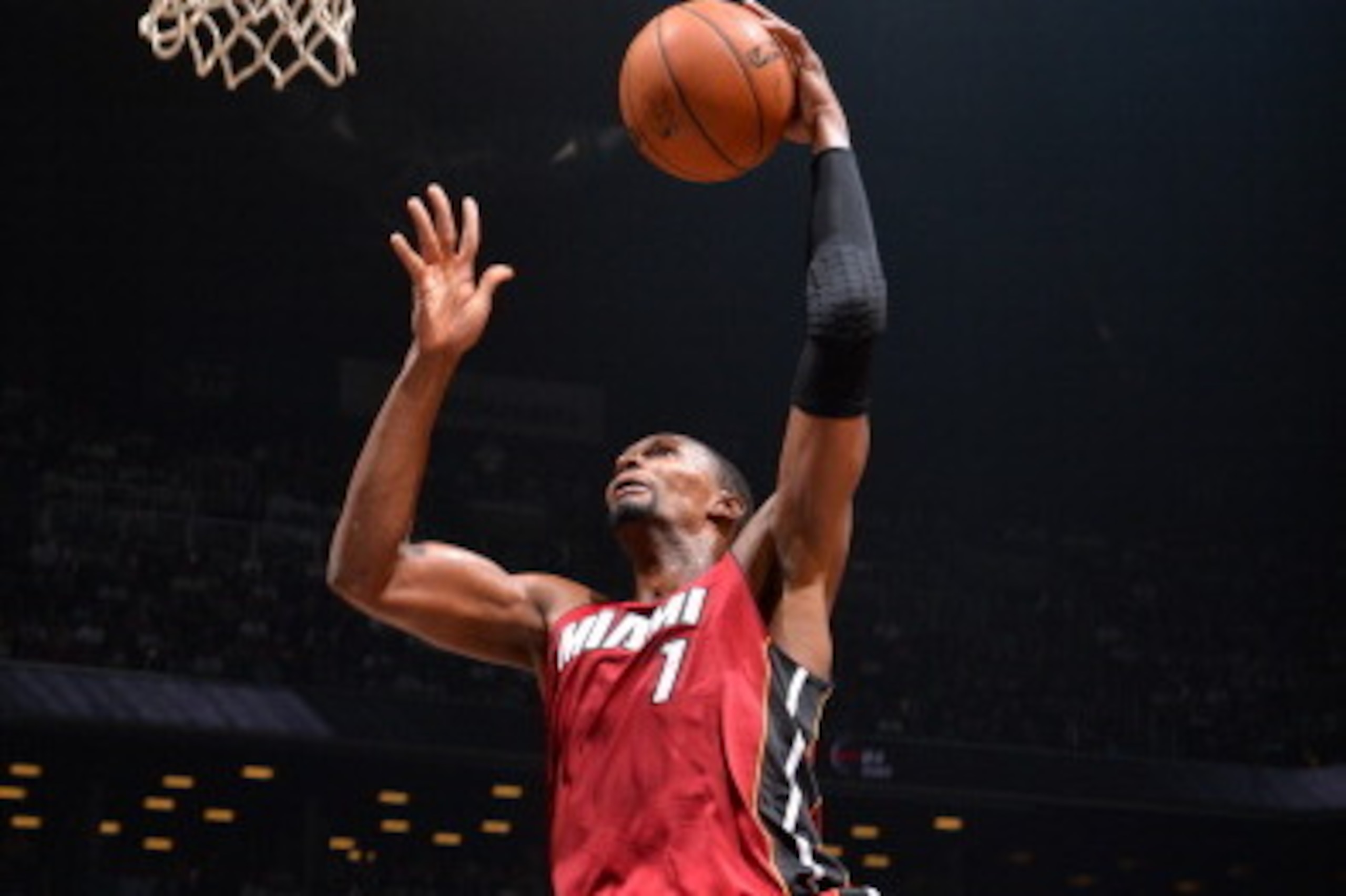 BROOKLYN, NY - MAY 12: Chris Bosh #1 of the Miami Heat goes up for a dunk against the Brooklyn Nets in Game Four of the Eastern Conference Semifinals on May 12, 2014 at Barclays Center in Brooklyn. NOTE TO USER: User expressly acknowledges and agrees that