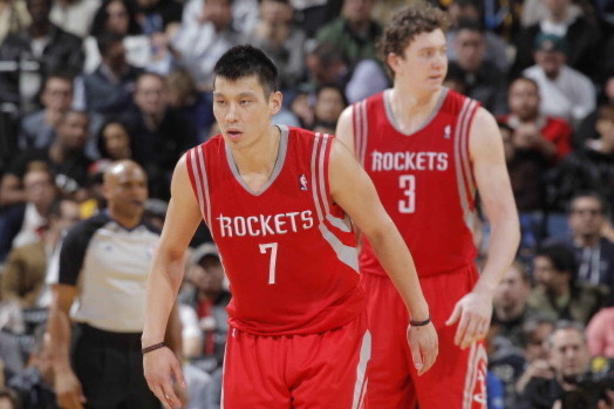 OAKLAND, CA - FEBRUARY 12:  Jeremy Lin #7 and Omer Asik #3 of the Houston Rockets in a game against the Golden State Warriors on February 12, 2013 at Oracle Arena in Oakland, California. NOTE TO USER: User expressly acknowledges and agrees that, by downlo