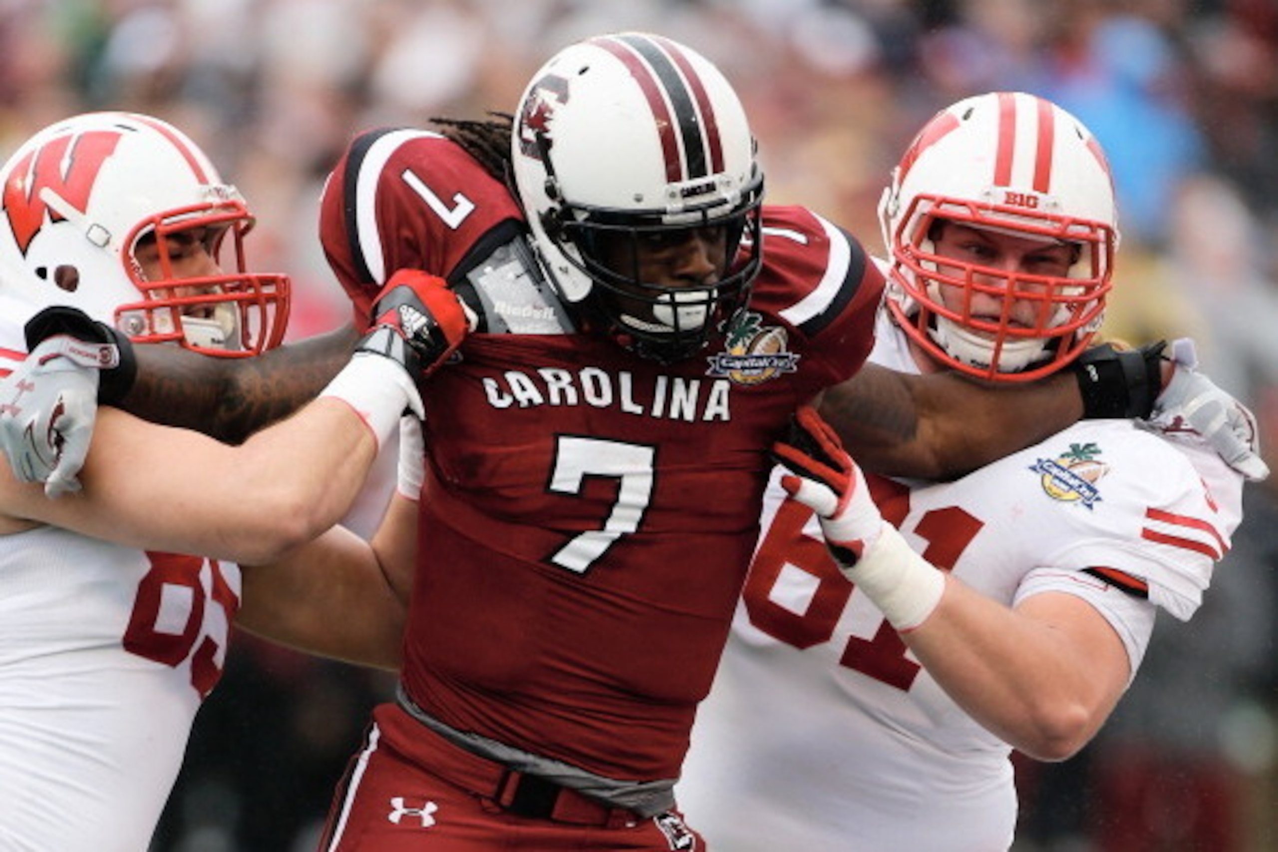 ORLANDO, FL - JANUARY 01:  Jadeveon Clowney #7 of the South Carolina Gamecocks in action during their game against the Wisconsin Badgers at the Capital One Bowl on January 1, 2014 in Orlando, Florida.  (Photo by Scott Halleran/Getty Images)
